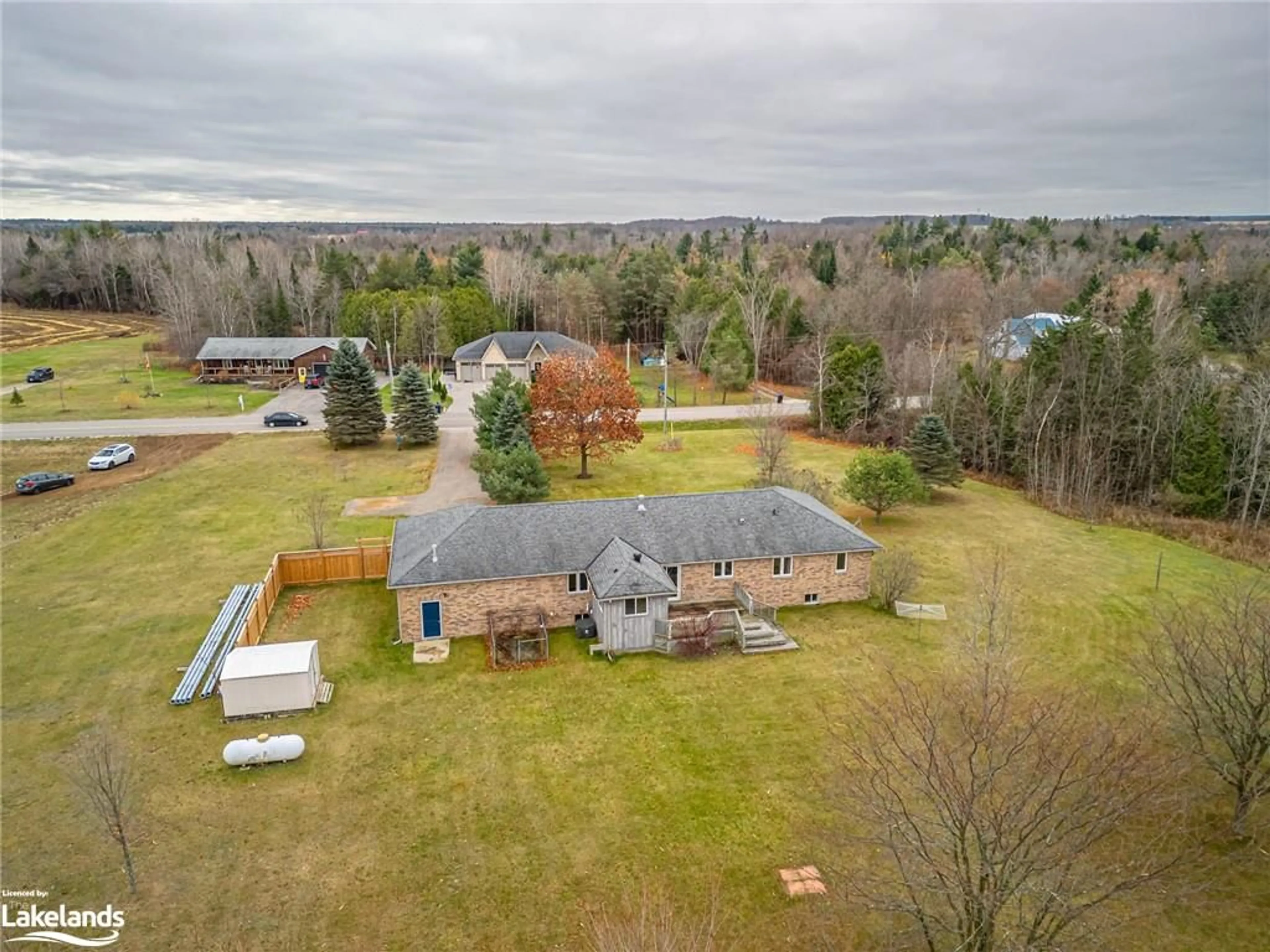 Frontside or backside of a home, the fenced backyard for 4228 Hogback Rd, Glencairn Ontario L0M 1K0