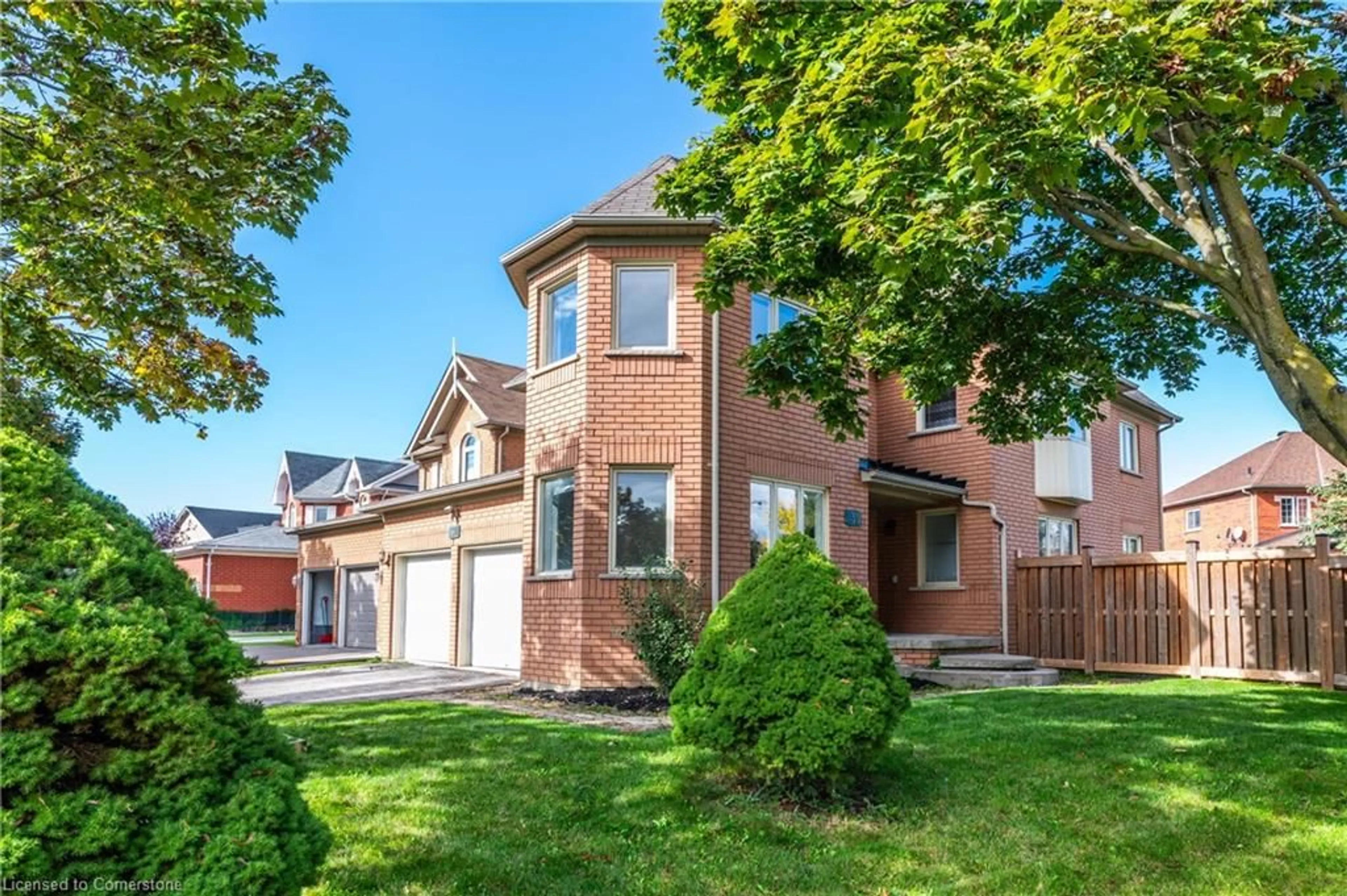 A pic from exterior of the house or condo, the fenced backyard for 139 Shady Pine Cir, Brampton Ontario L6R 1N6