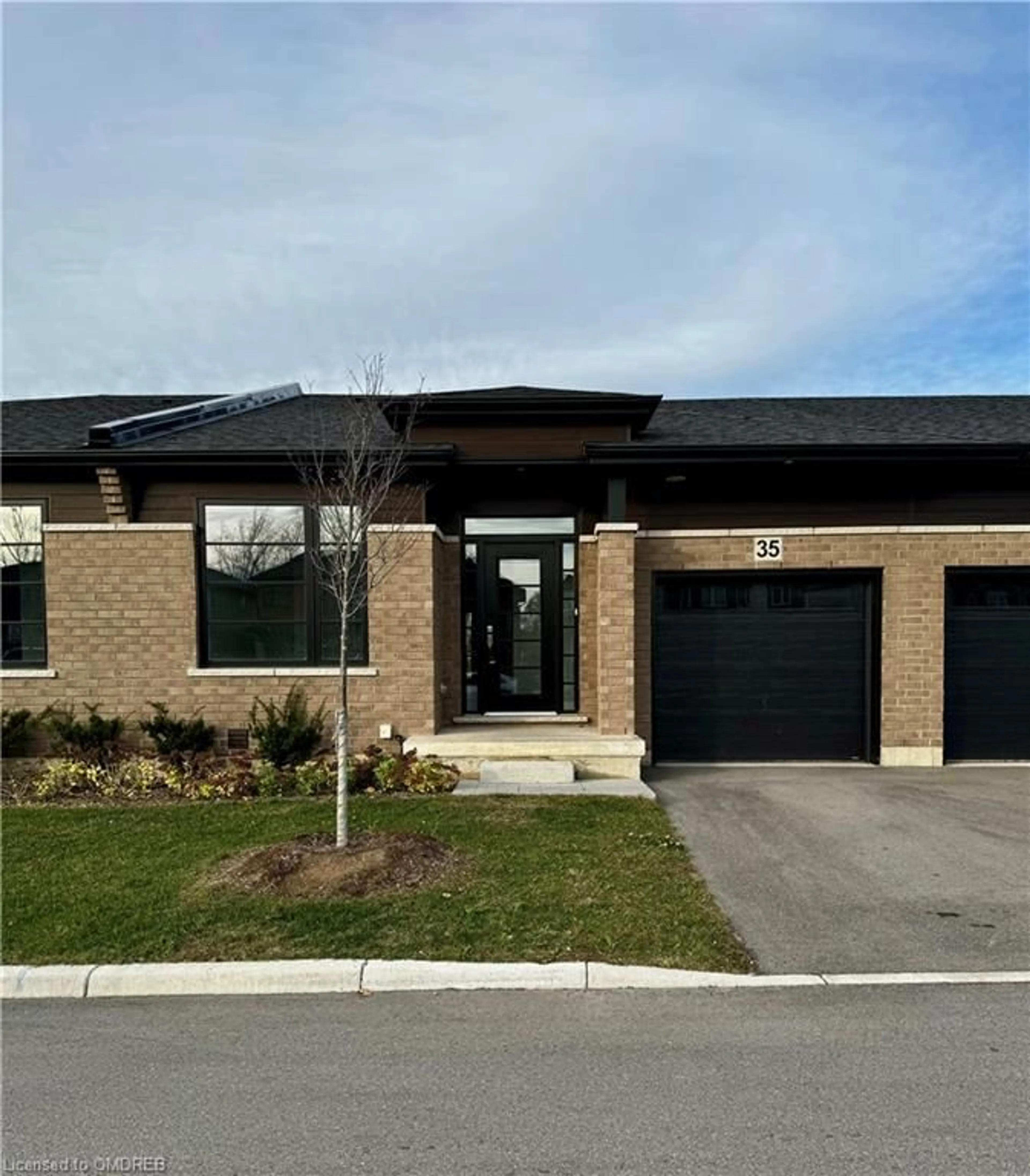 Home with brick exterior material for 550 Grey St #35, Brantford Ontario N3S 0C4