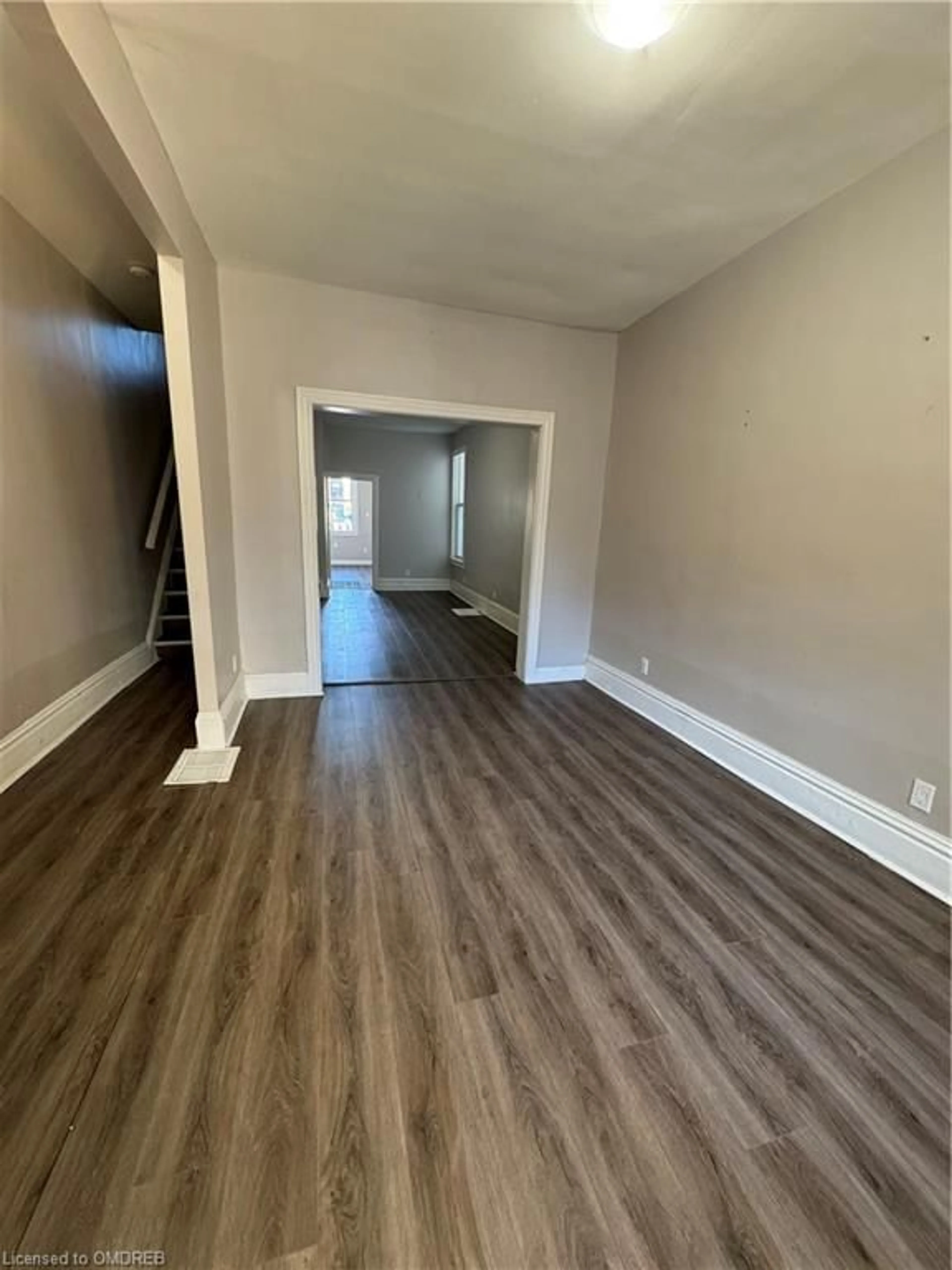 A pic of a room, wood floors for 75 Cathcart St, Hamilton Ontario L8R 1M6