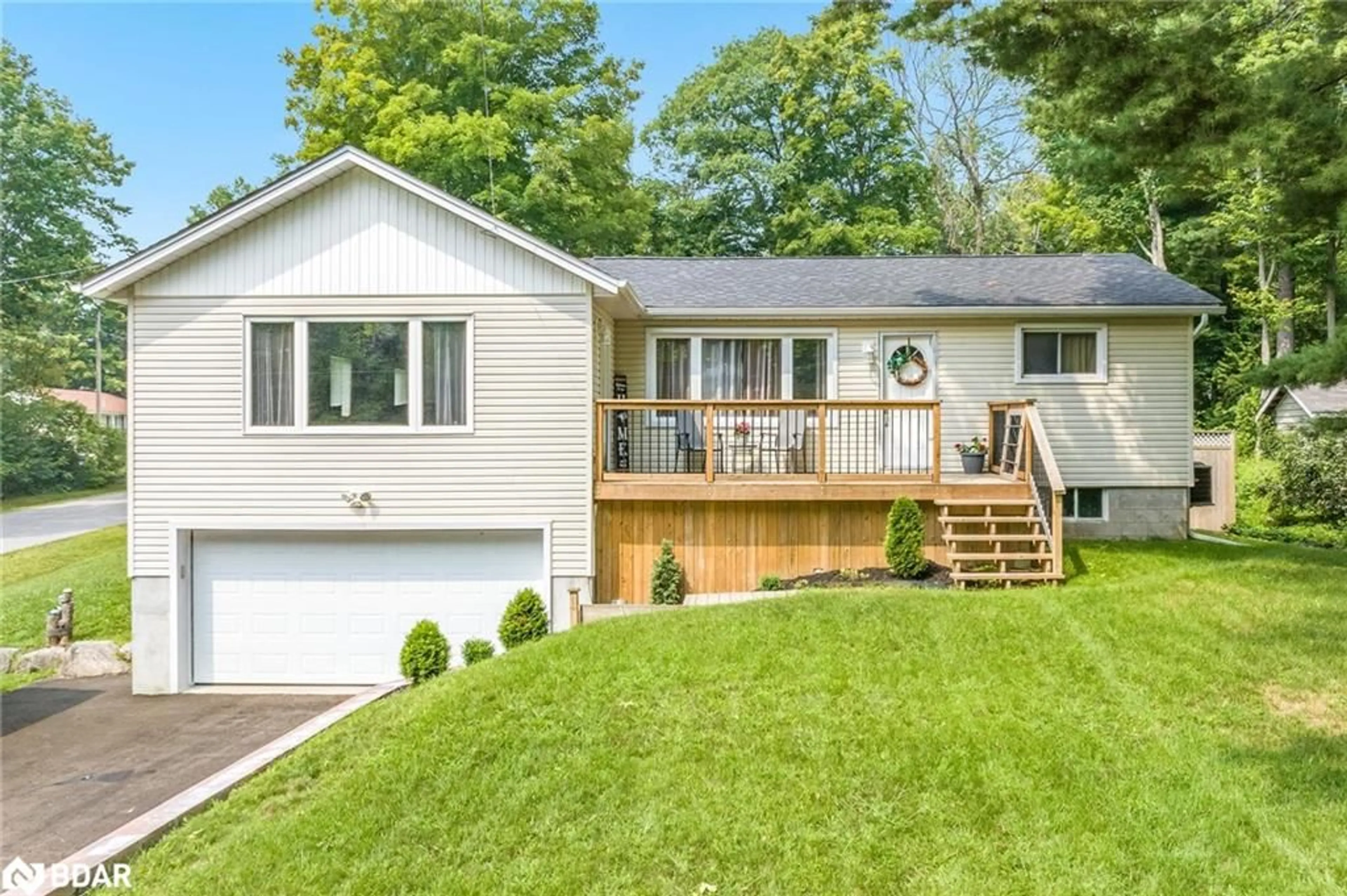 Frontside or backside of a home, cottage for 328 Peek-A-Boo Trail, Tiny Ontario L9M 0B3