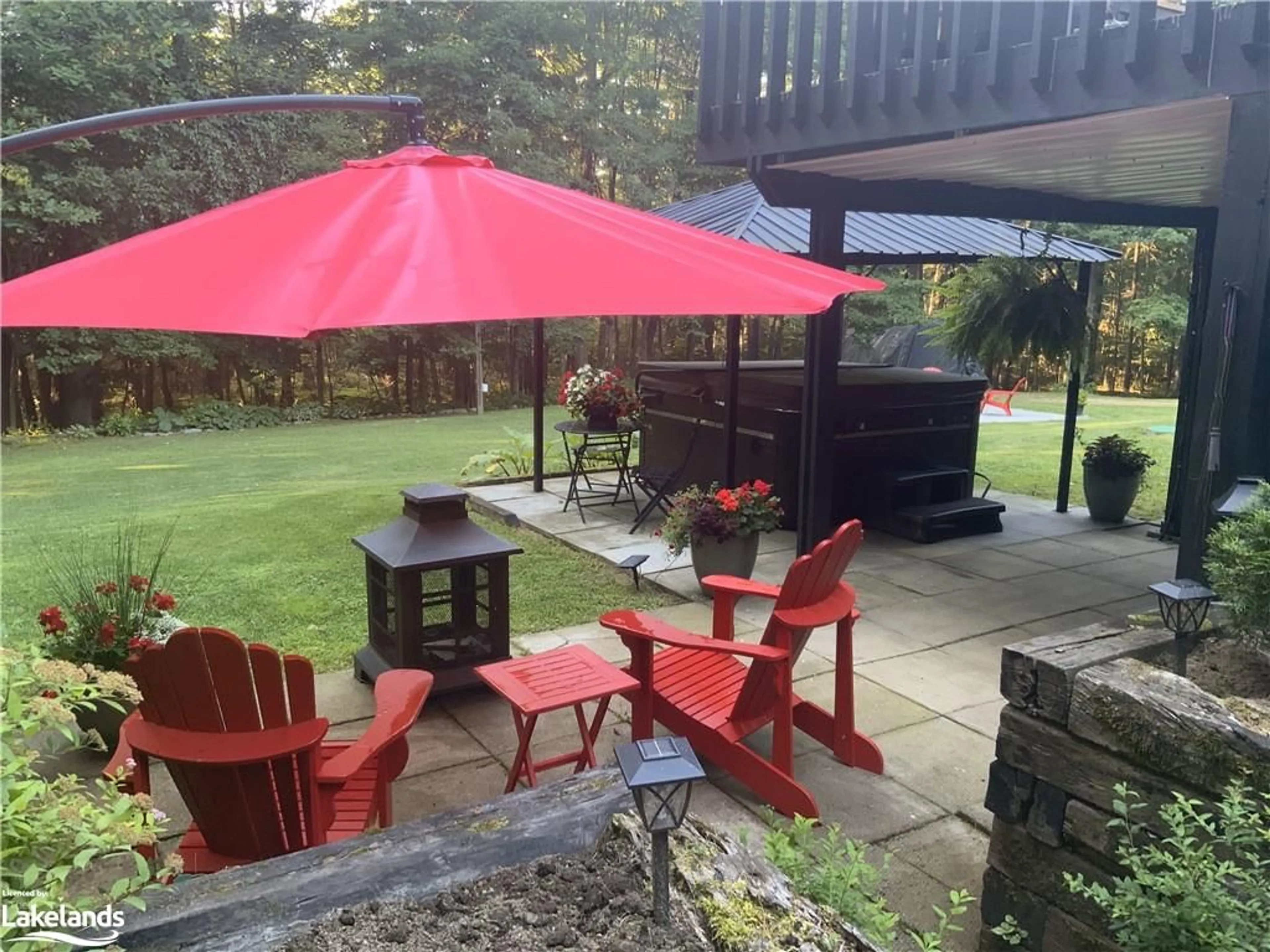 Patio, the fenced backyard for 28 Tall Pine Rd, Port Sydney Ontario P0B 1L0