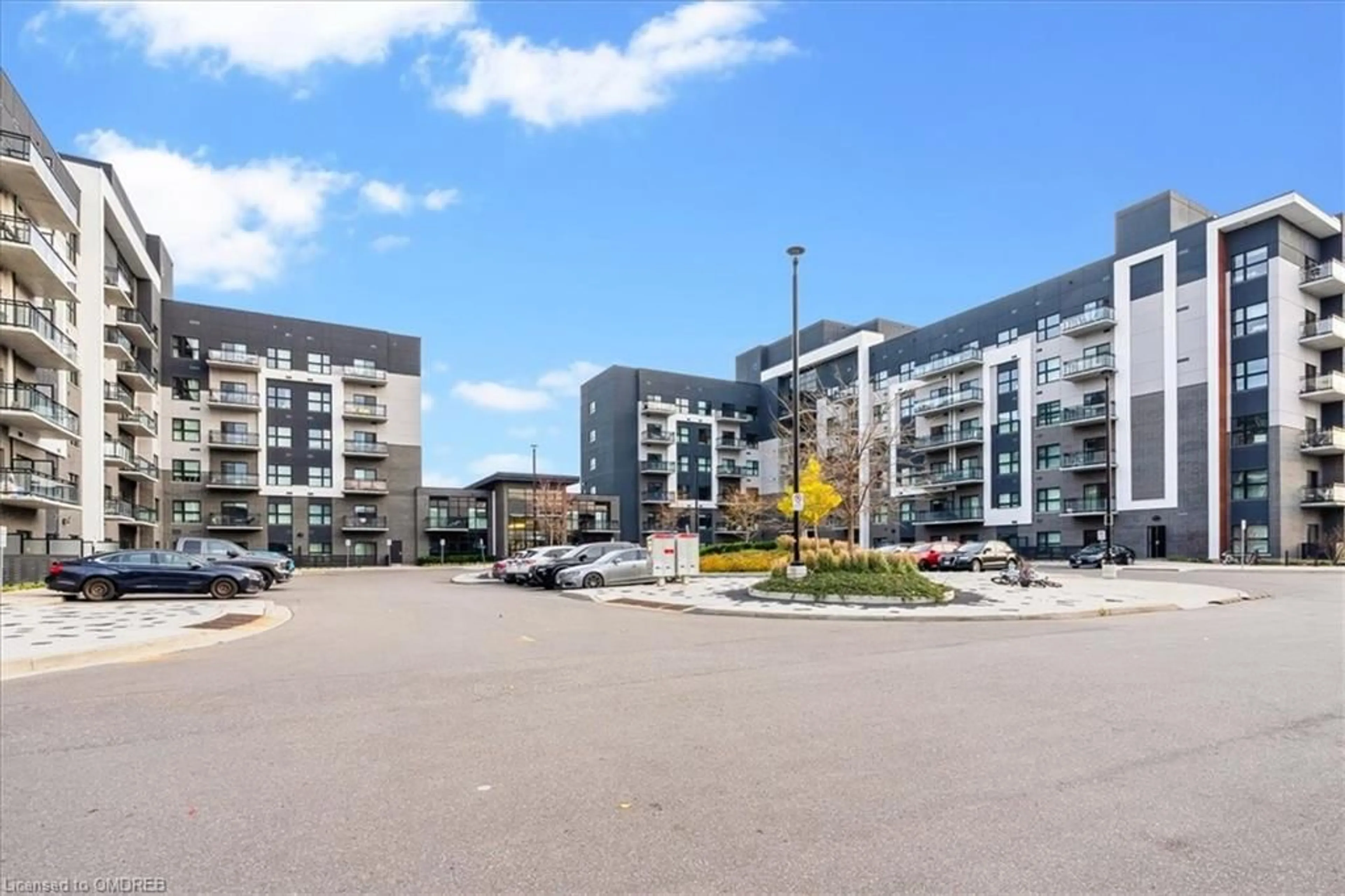 A pic from exterior of the house or condo, the street view for 102 Grovewood Common #535, Oakville Ontario L6H 0X2