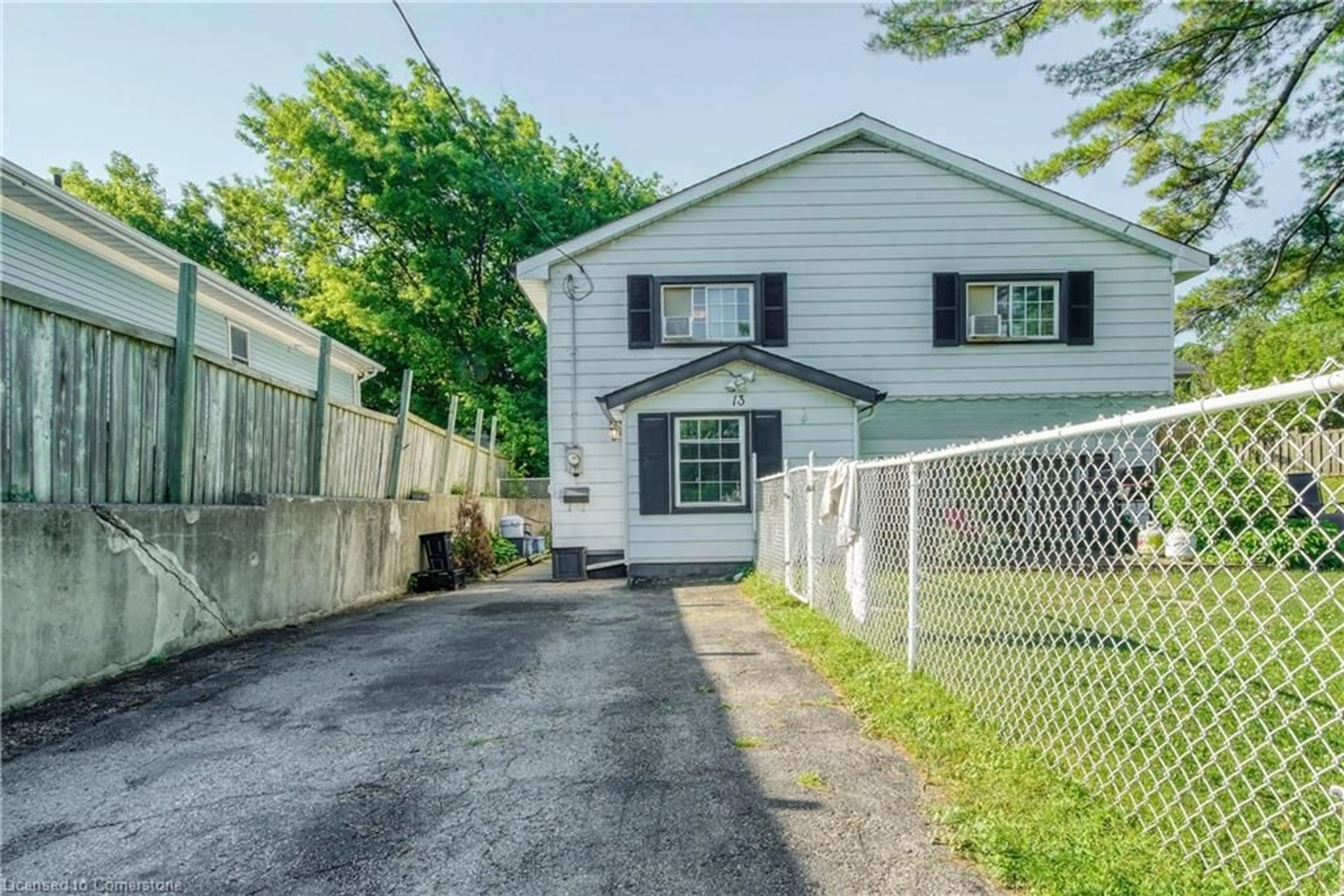 Frontside or backside of a home, the fenced backyard for 13 Brooklyne Rd, Cambridge Ontario N1R 1C4