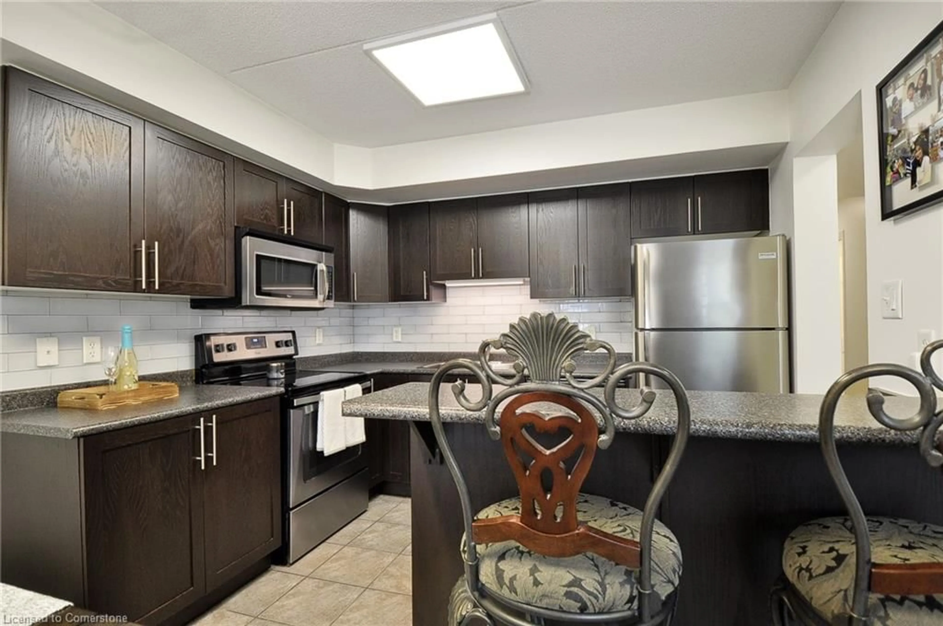 Standard kitchen, wood floors, cottage for 950 Highland Rd #1, Kitchener Ontario N2N 0A5