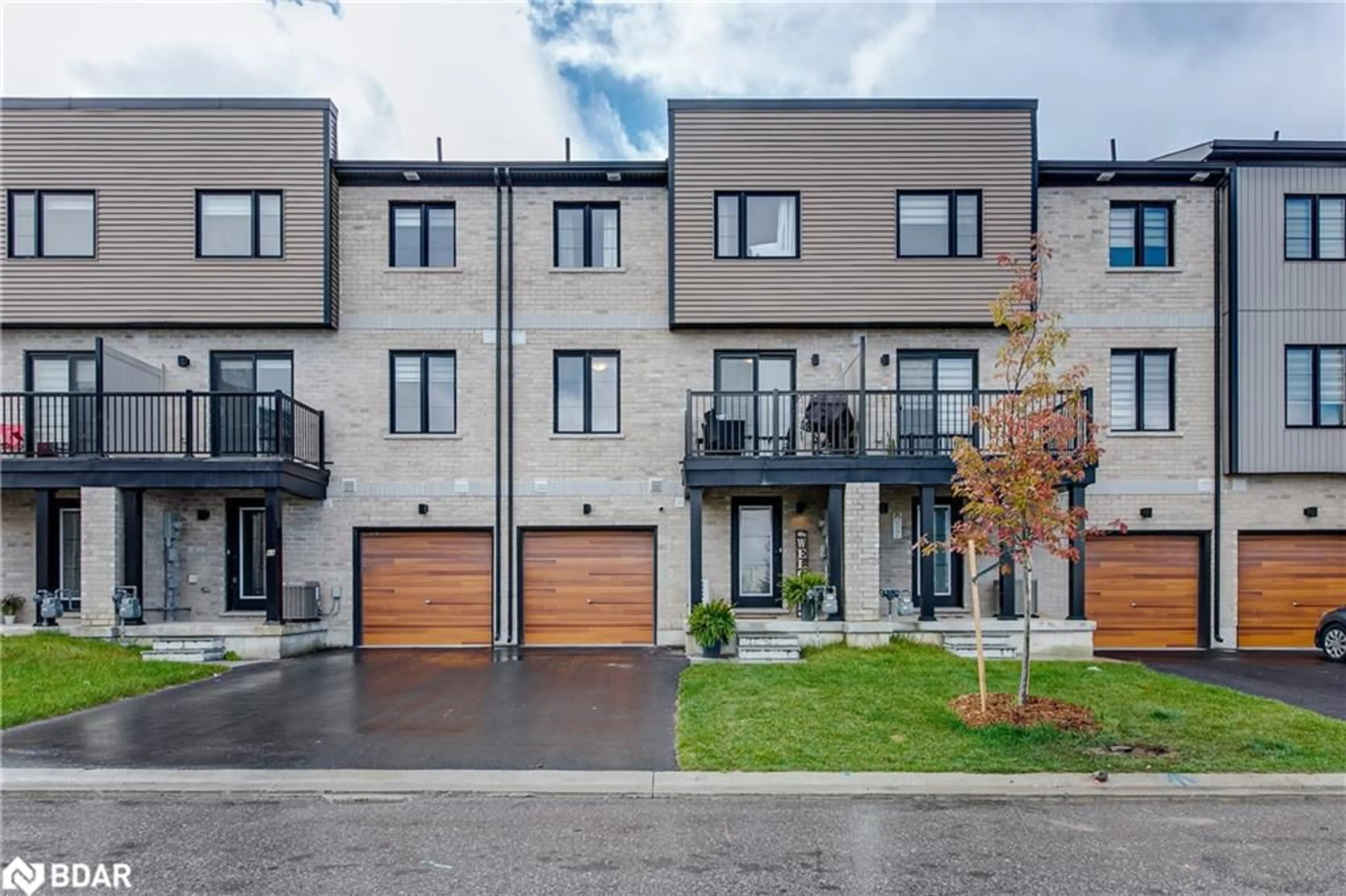 A pic from exterior of the house or condo, the fenced backyard for 66 Pumpkin Corner Cres, Barrie Ontario L9J 0T8