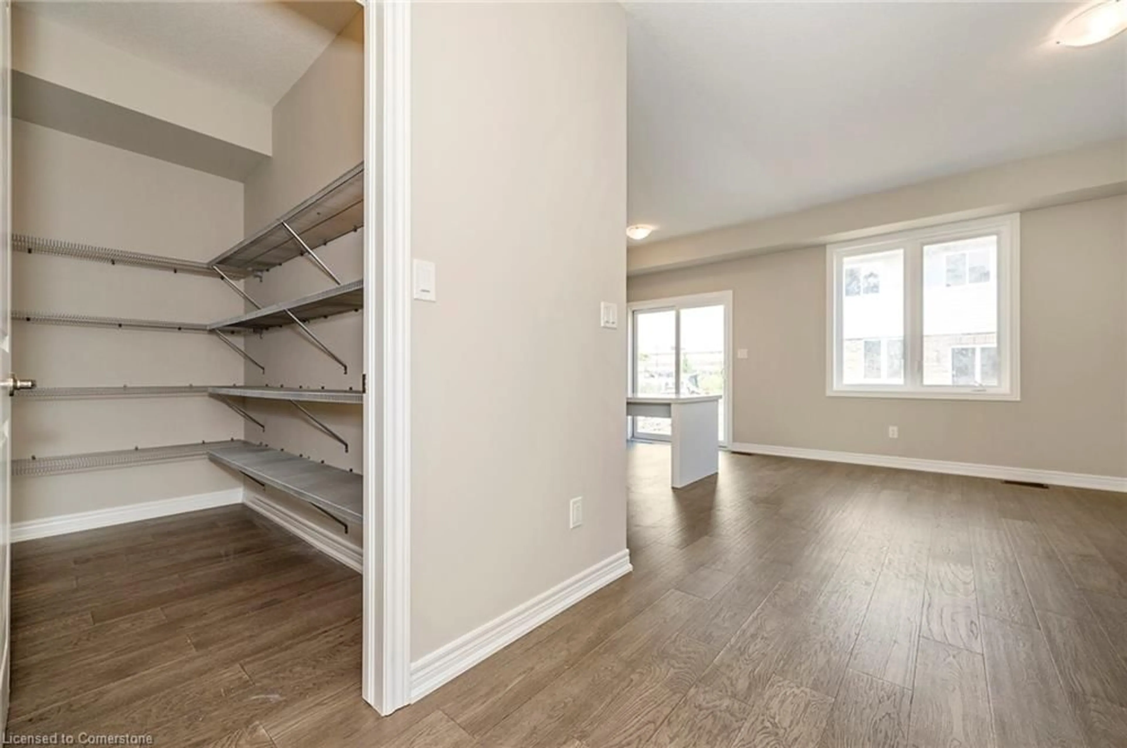 A pic of a room, wood floors for 24 Jellicoe Crt, Hamilton Ontario L9A 4T1