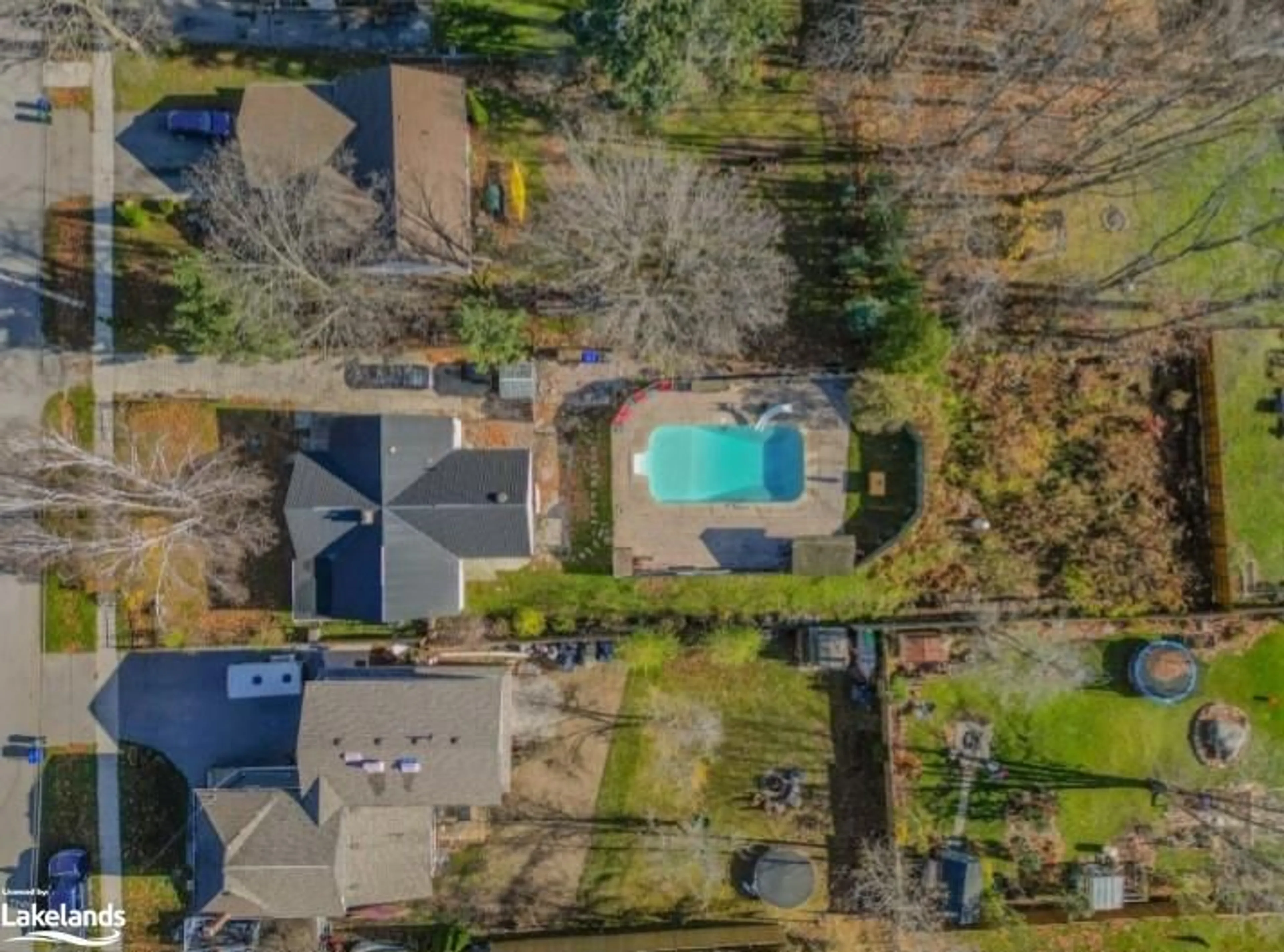 Frontside or backside of a home, the fenced backyard for 67 Maple St, Victoria Harbour Ontario L0K 2A0