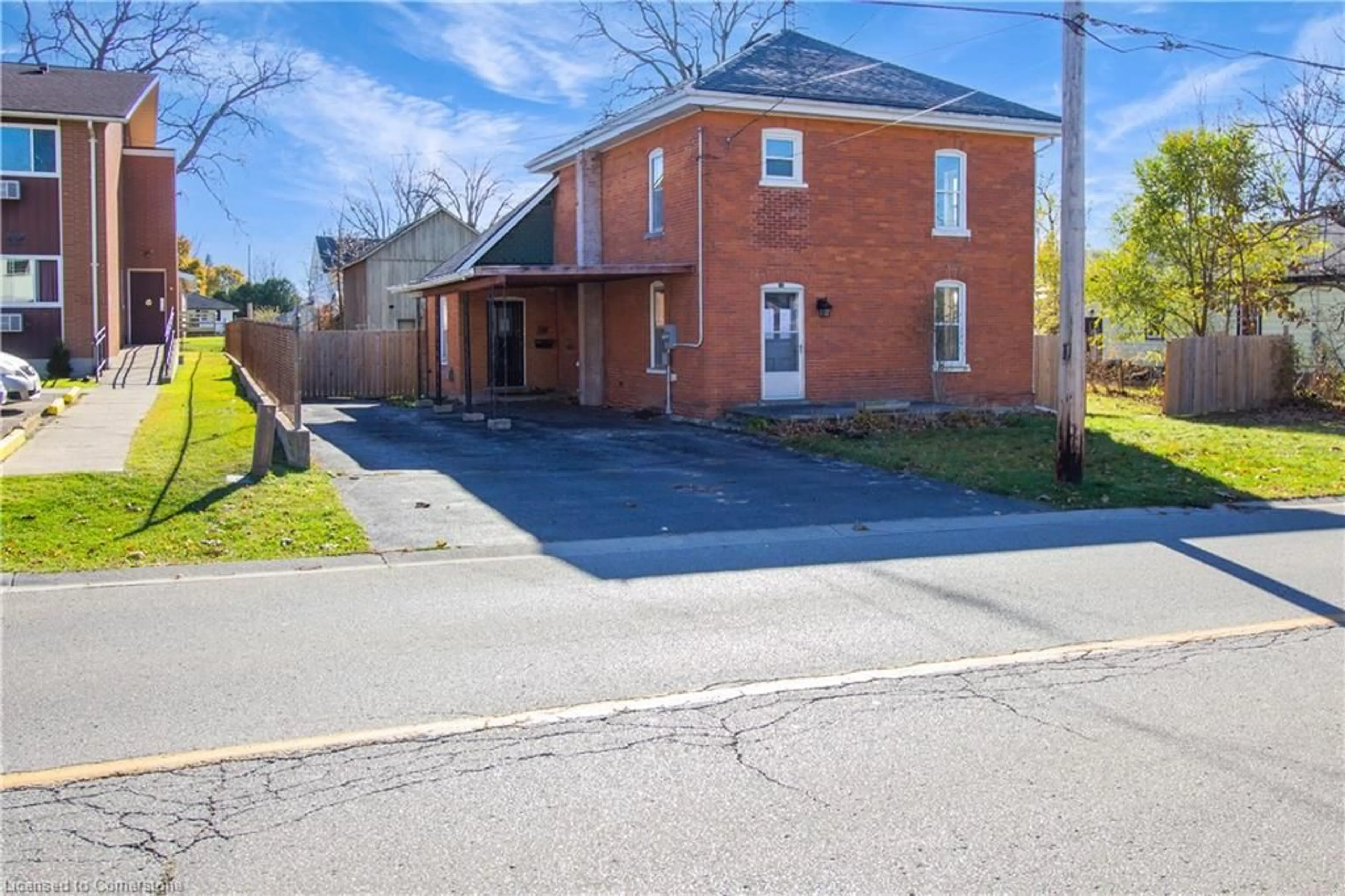 Home with brick exterior material for 74 William St, Delhi Ontario N4B 1M5