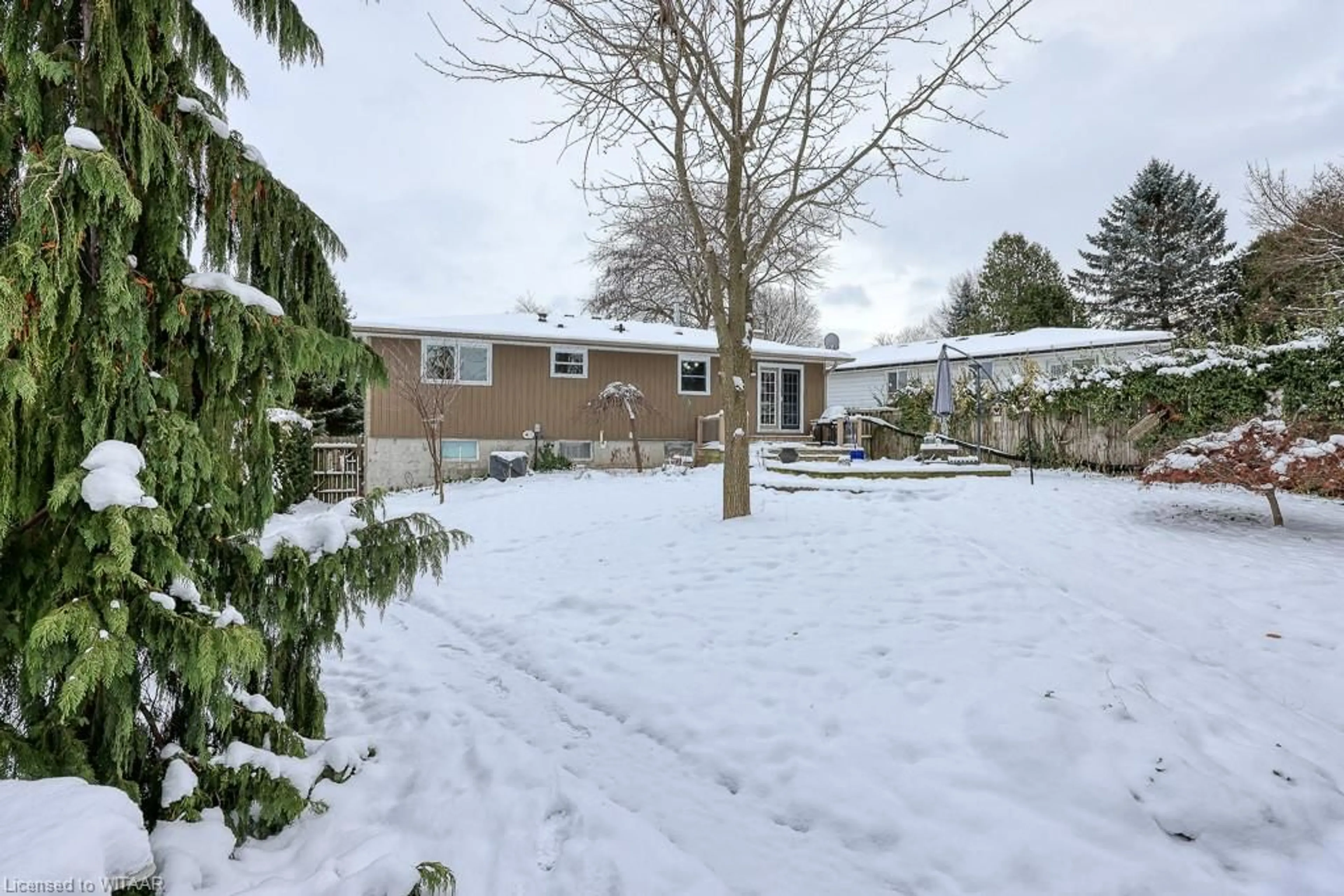 Patio, the fenced backyard for 35 Silcox Pl, Woodstock Ontario N4S 8M8