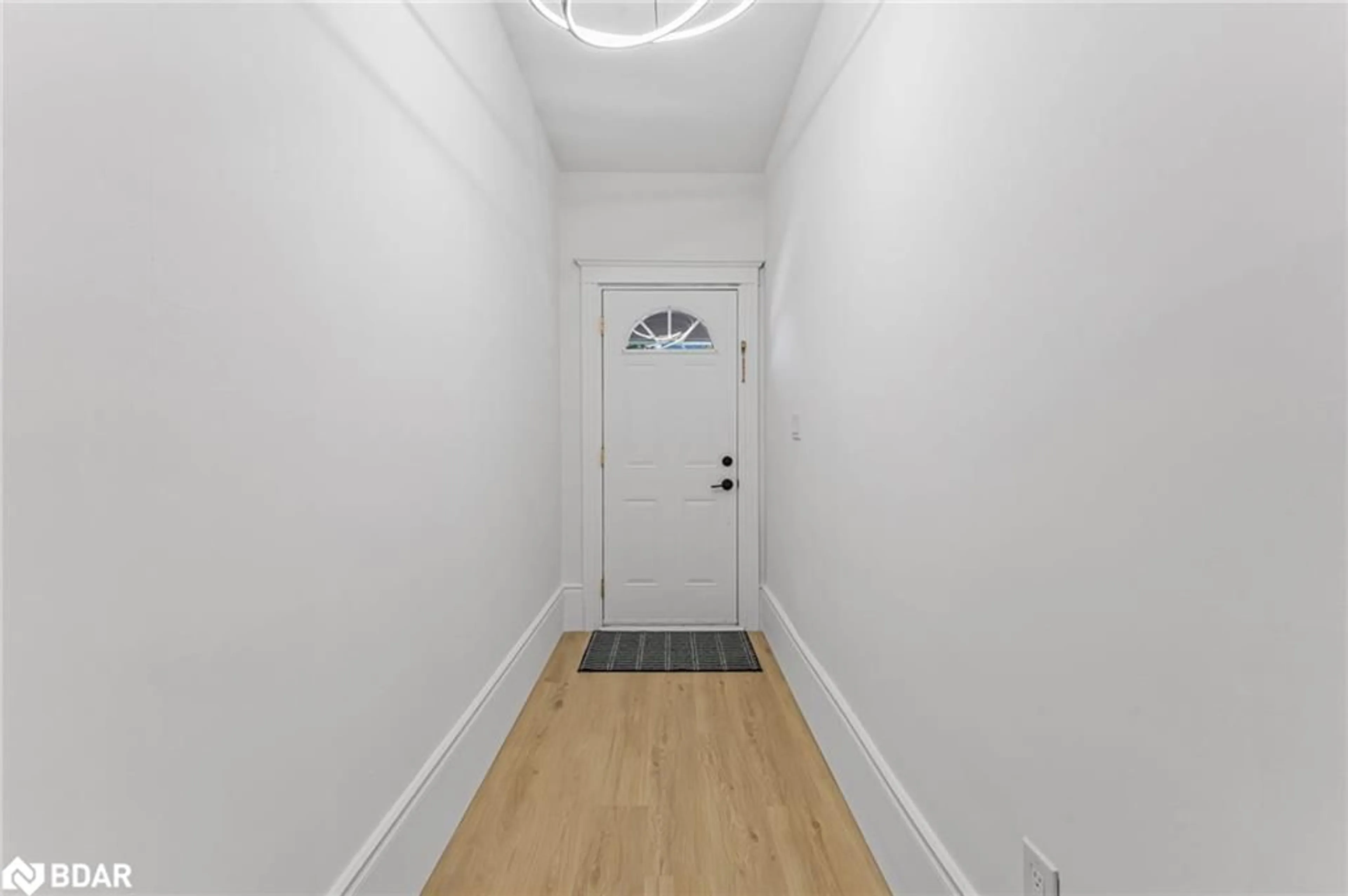 Indoor entryway, wood floors for 57 Stirton St, Hamilton Ontario L8L 6E7