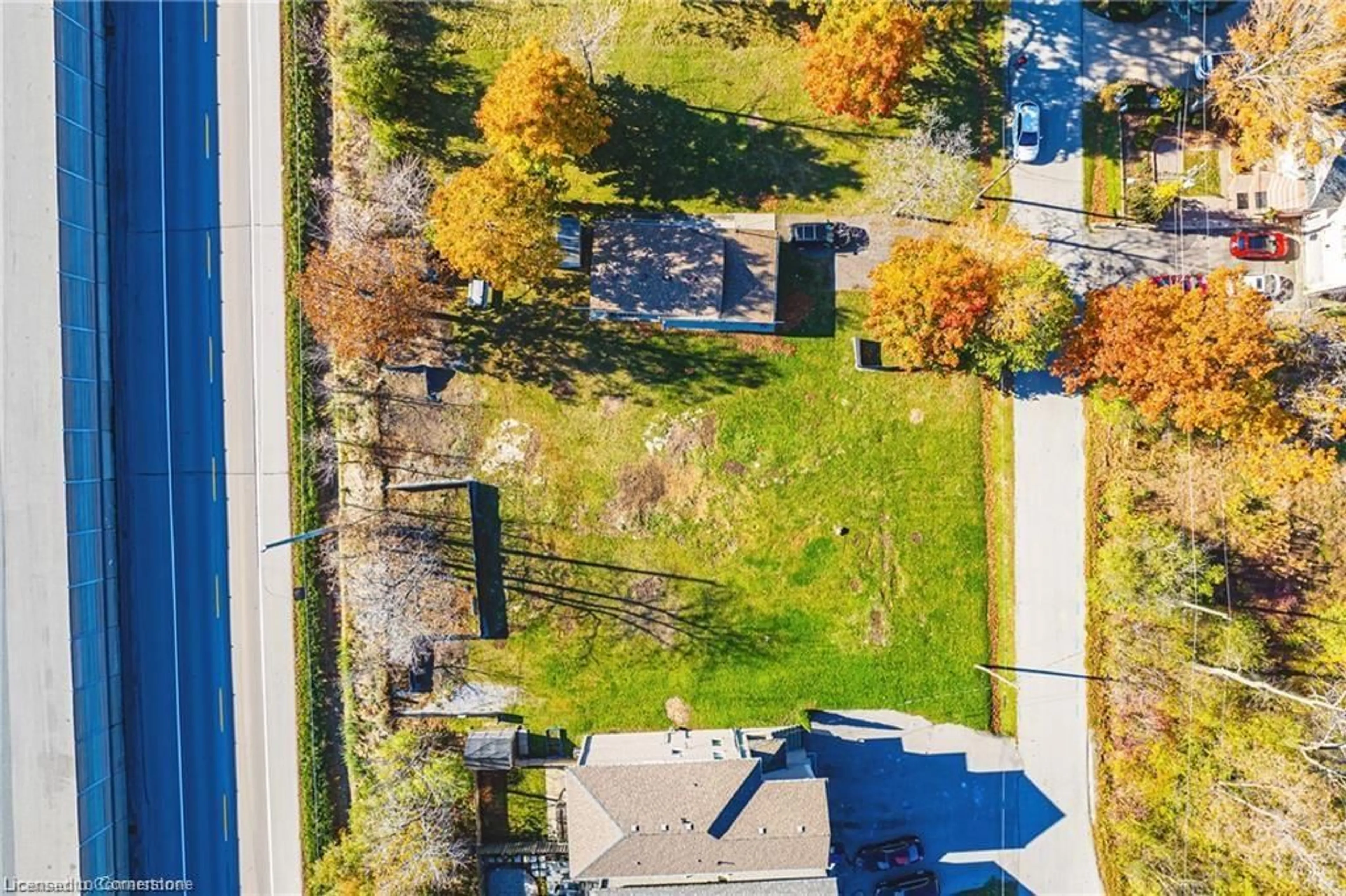 Frontside or backside of a home, the fenced backyard for 5 Trillium Ave, Stoney Creek Ontario L8E 5E1