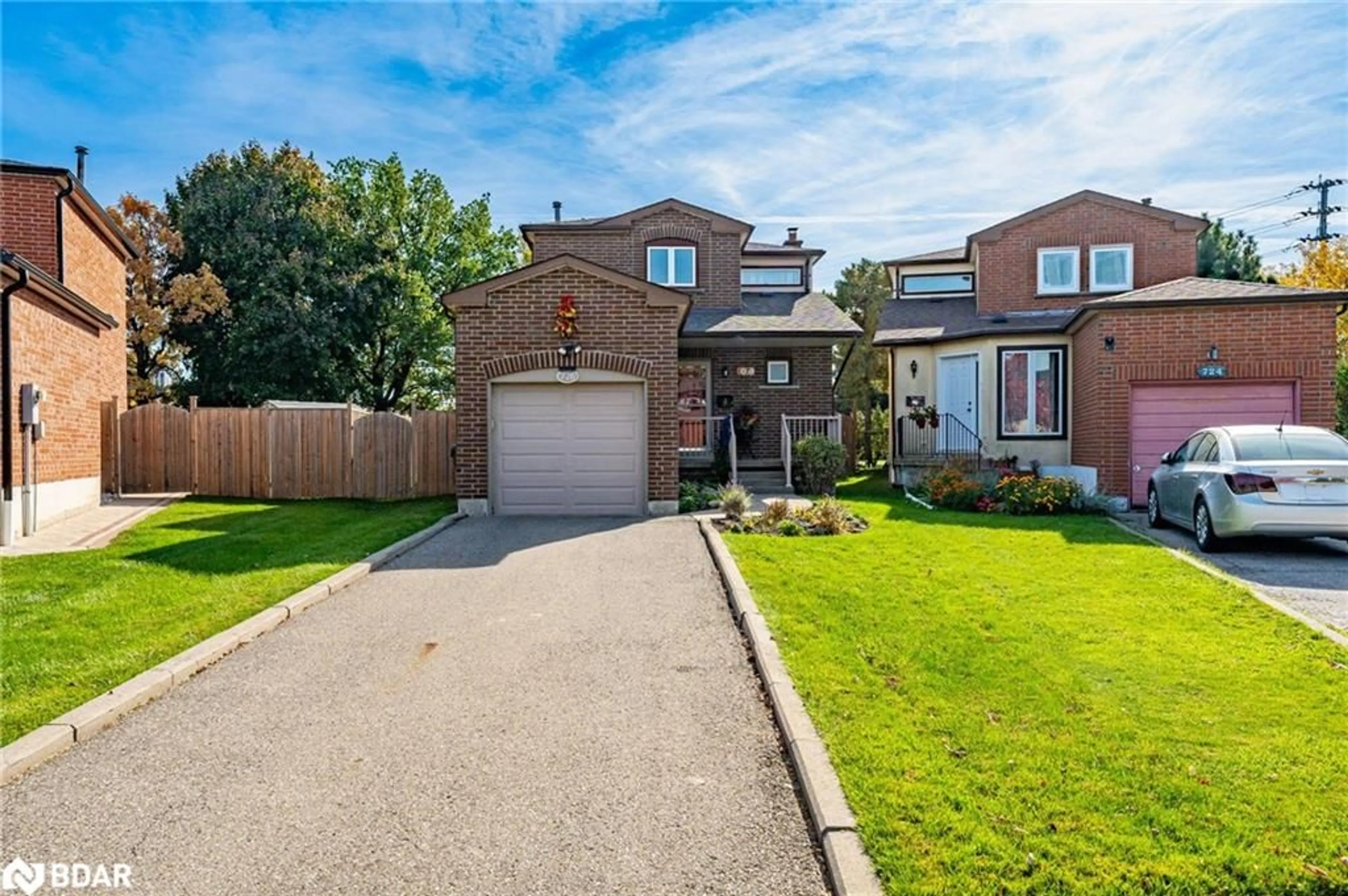 A pic from exterior of the house or condo, the fenced backyard for 726 Greycedar Cres, Mississauga Ontario L4W 3J8