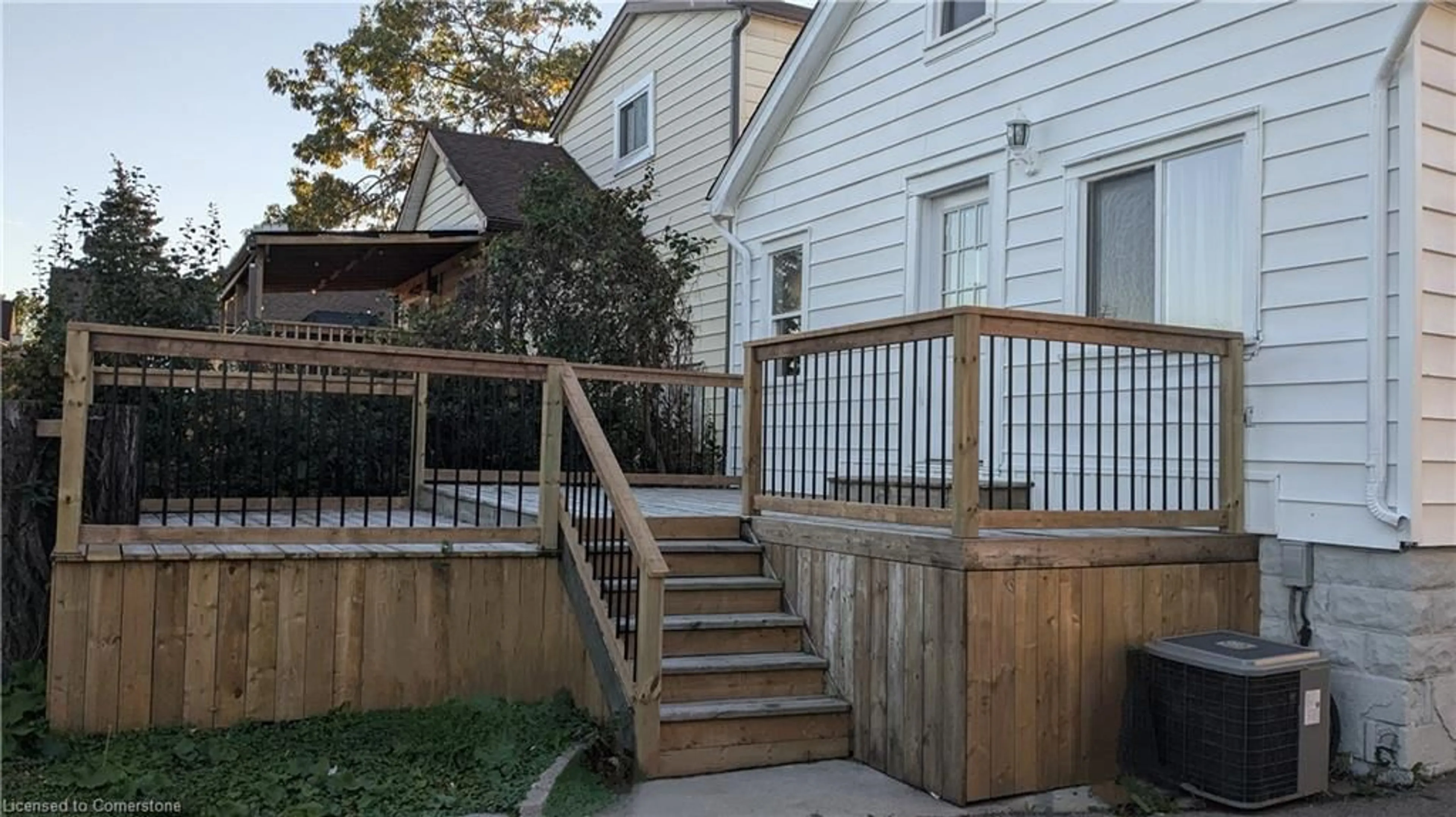 Patio, the fenced backyard for 590 Woodward Ave, Hamilton Ontario L8H 6P1