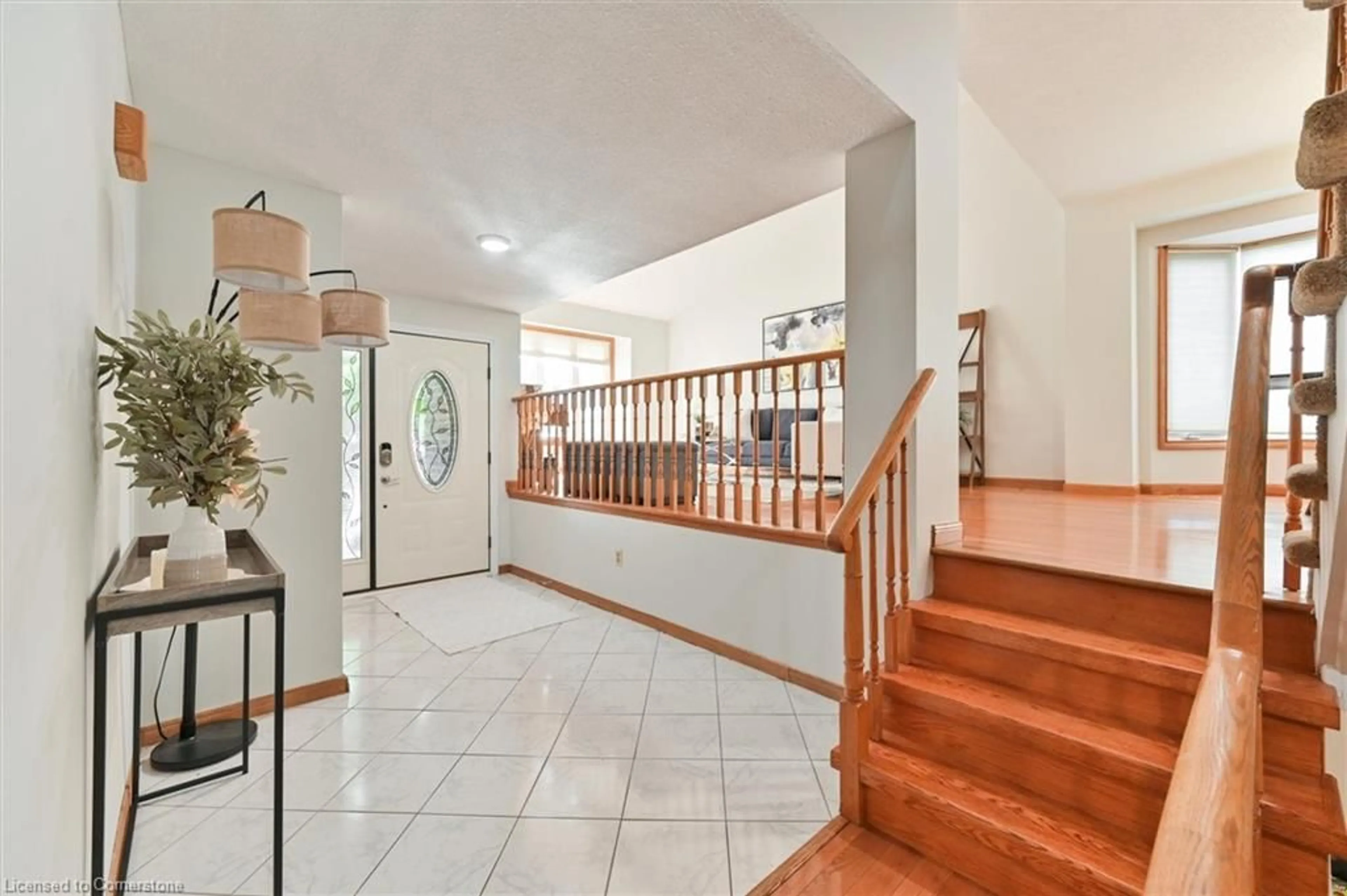 Indoor foyer, wood floors for 2368 Folkway Dr, Mississauga Ontario L5L 3B6