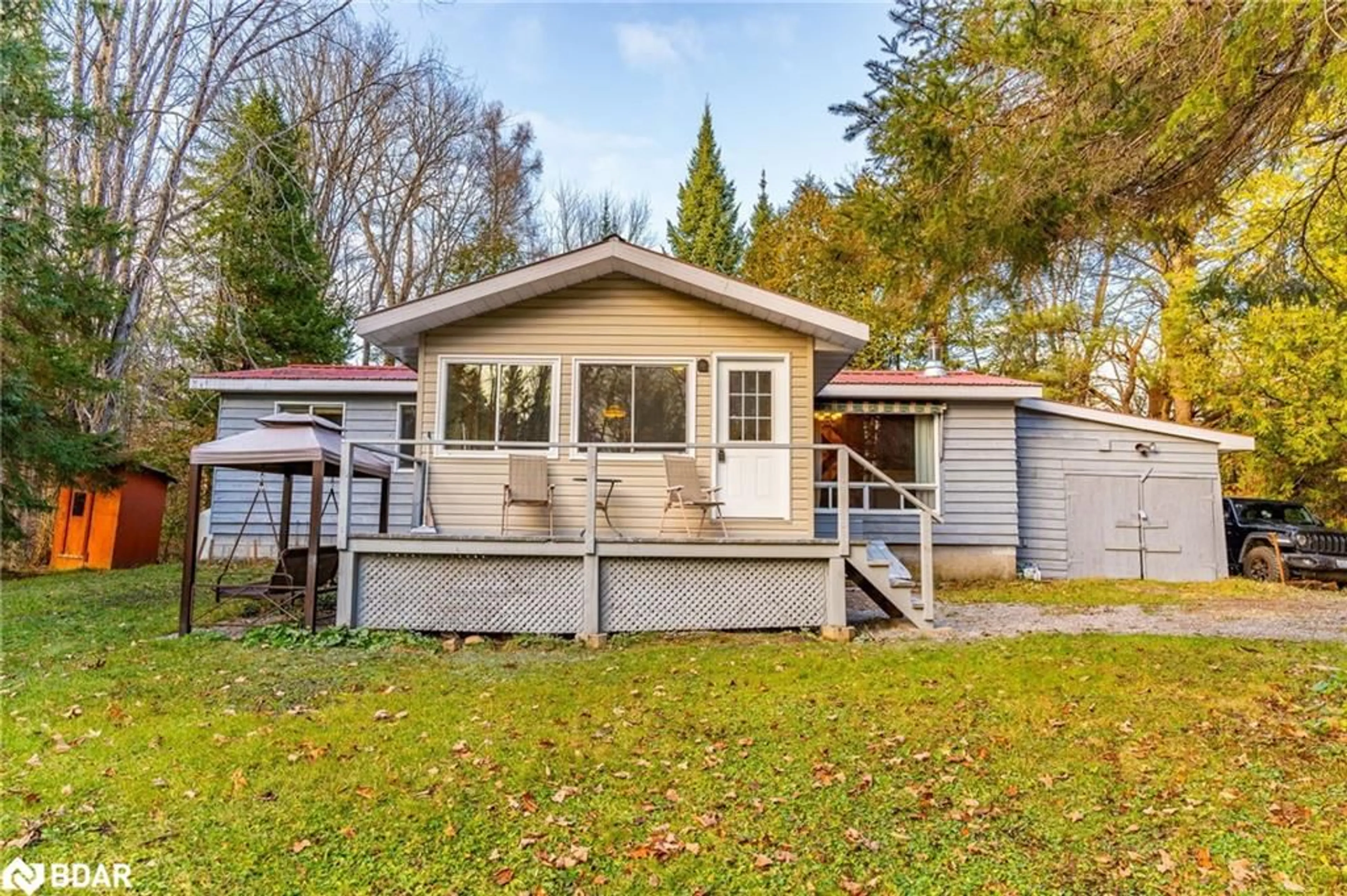 Frontside or backside of a home, cottage for 121 Salmon Lake Rd, Buckhorn Ontario K0L 1J0