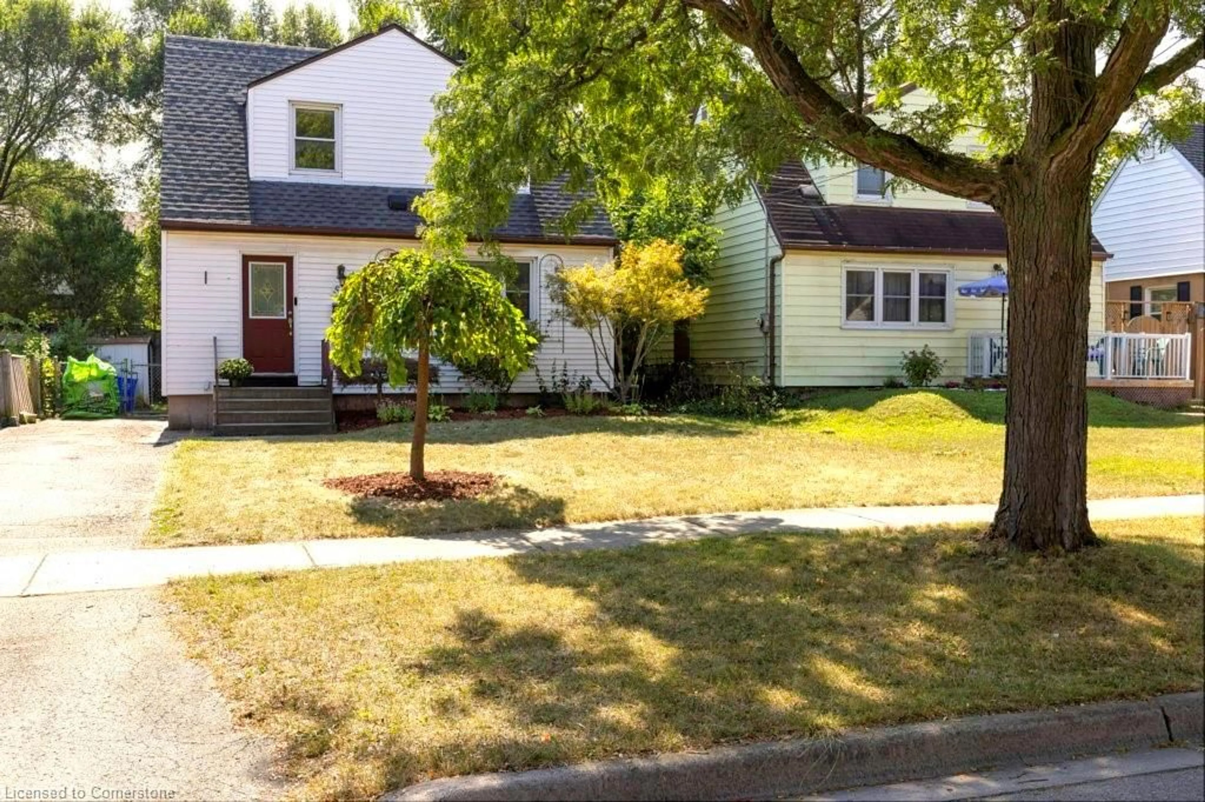 Frontside or backside of a home, the street view for 52 Martha St, Hamilton Ontario L8H 2B7