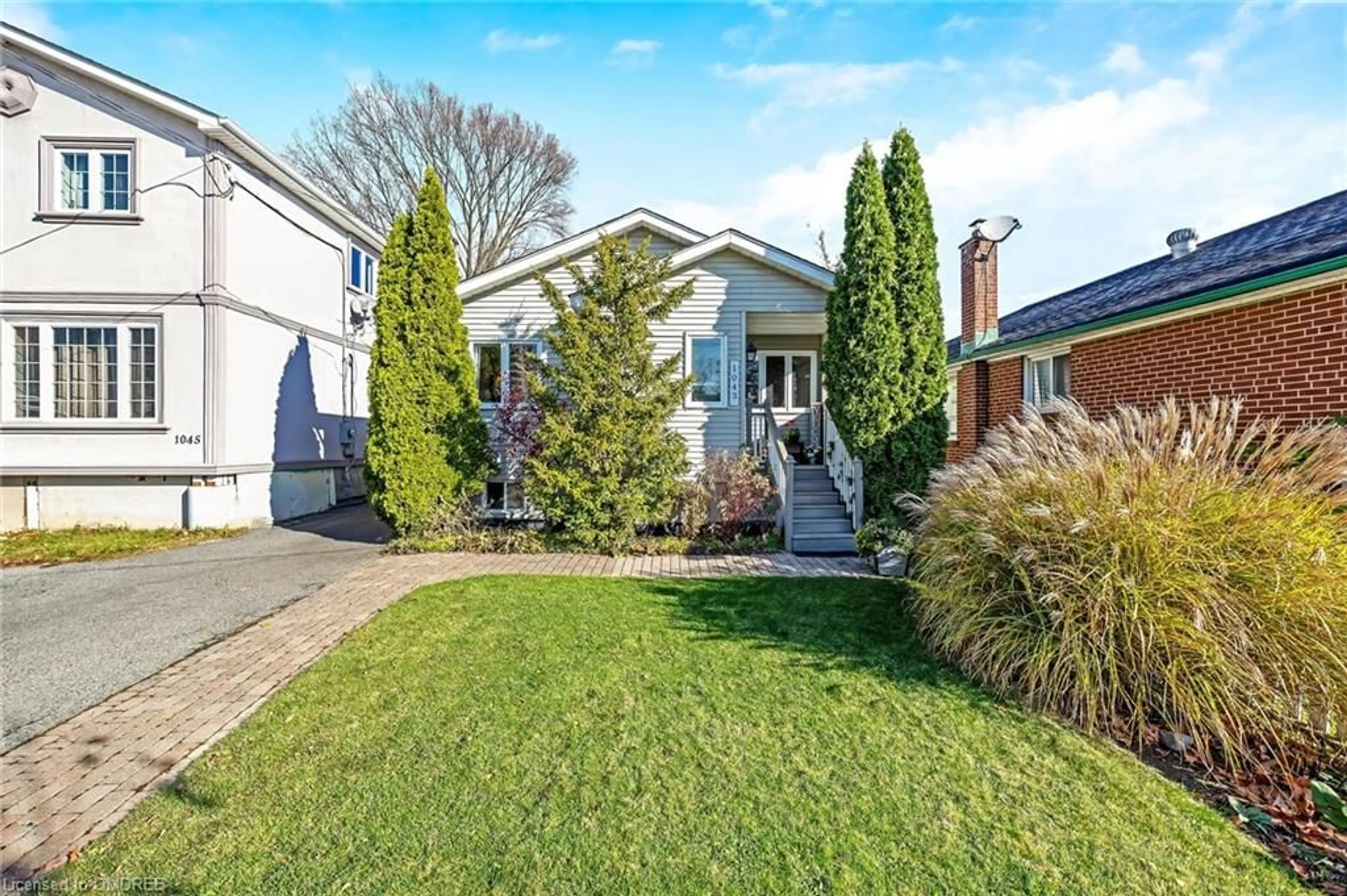 Frontside or backside of a home, the fenced backyard for 1043 Cawthra Rd, Mississauga Ontario L5G 4K4