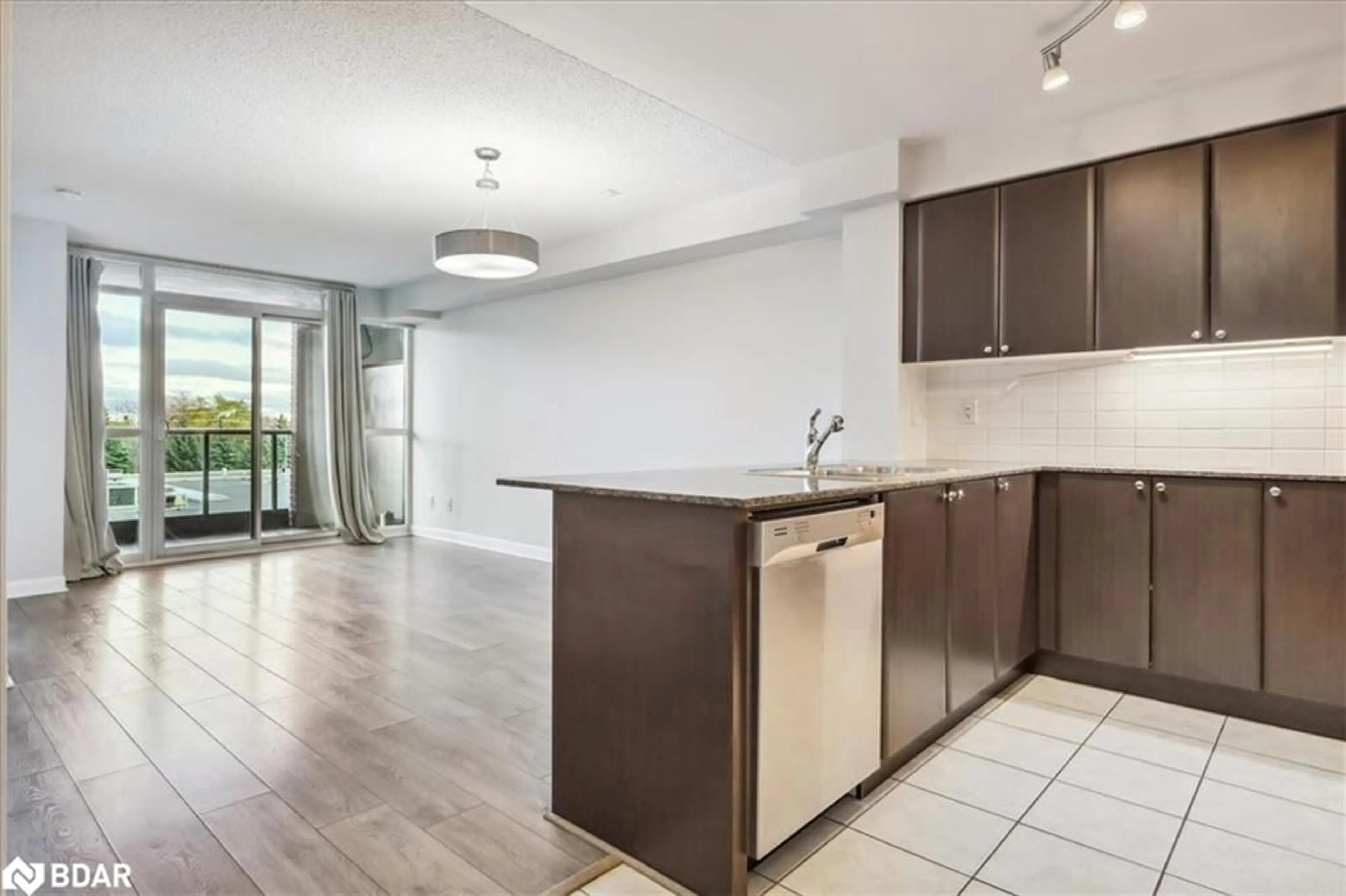 Open concept kitchen for 525 Wilson Ave #405, North York Ontario M3H 0A7