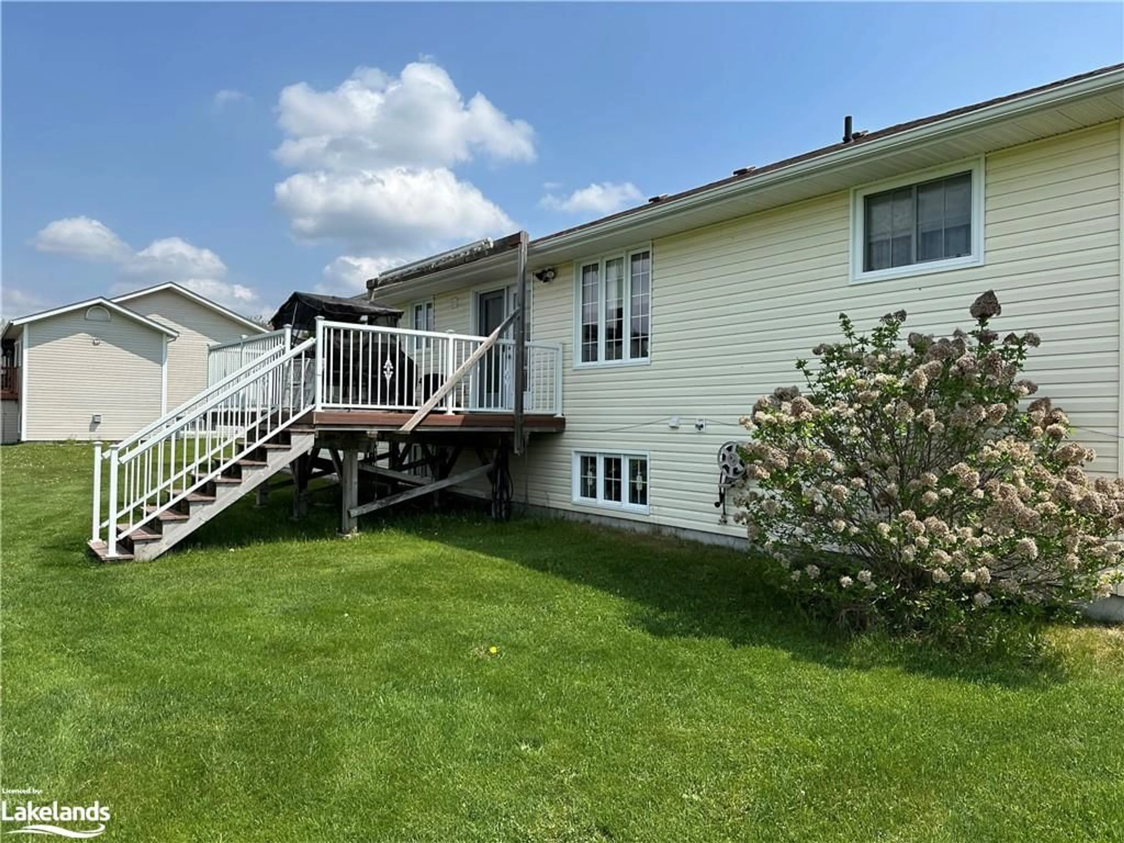 Frontside or backside of a home, the fenced backyard for 37 Tamerack Ave, Sturgeon Falls Ontario P2B 3H3