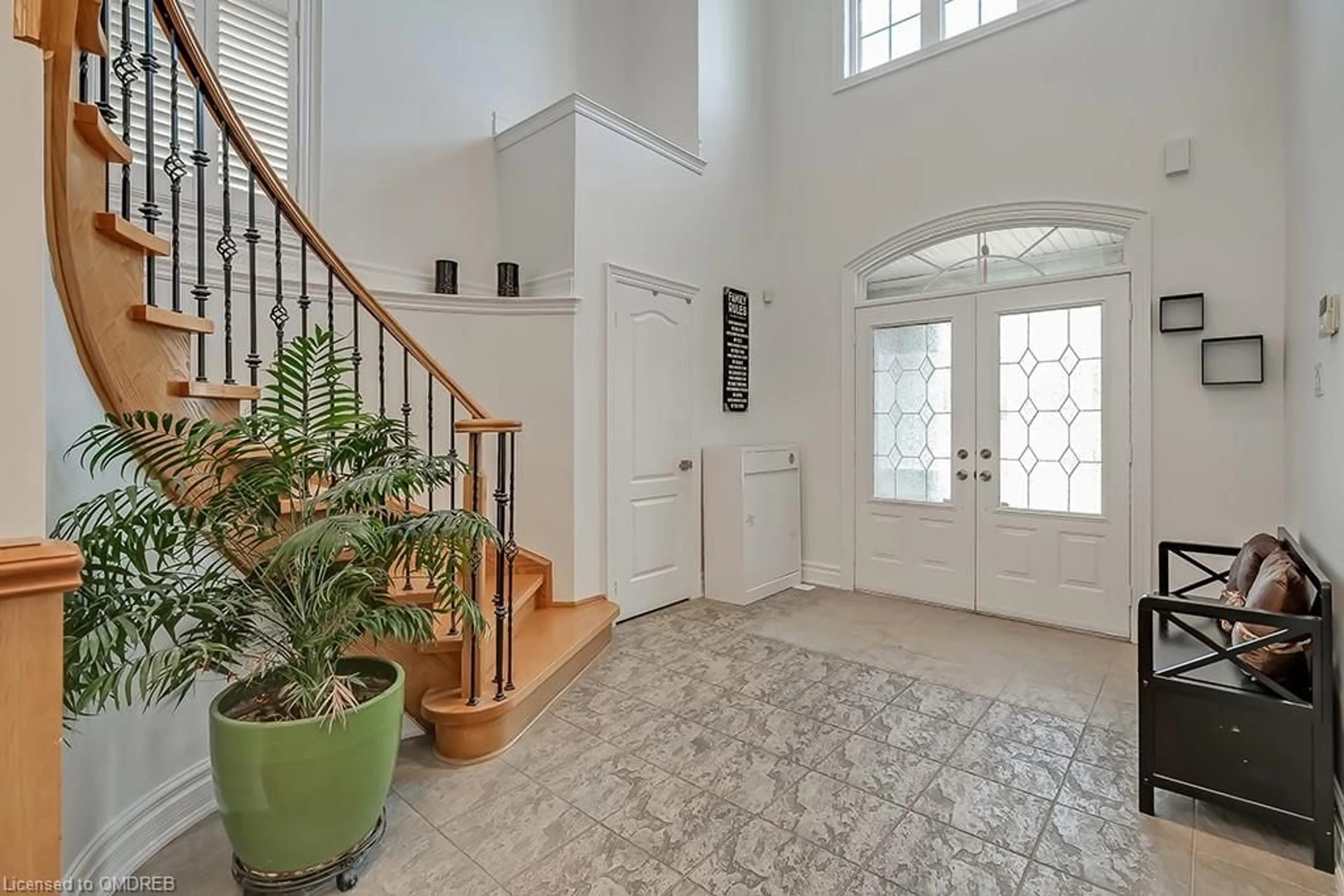 Indoor entryway, wood floors for 2452 North Ridge Trail, Oakville Ontario L6H 7N6