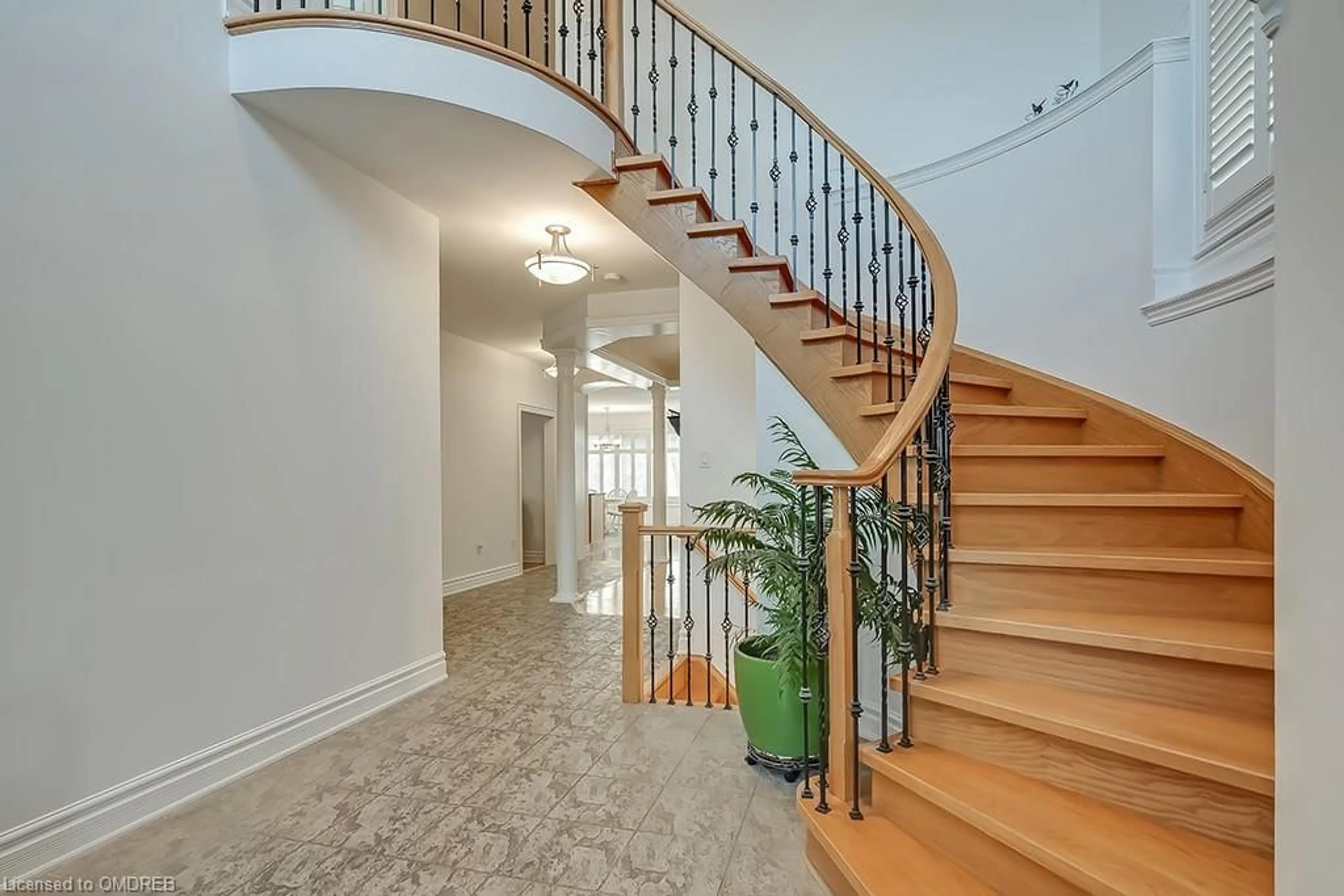 Indoor foyer, wood floors for 2452 North Ridge Trail, Oakville Ontario L6H 7N6