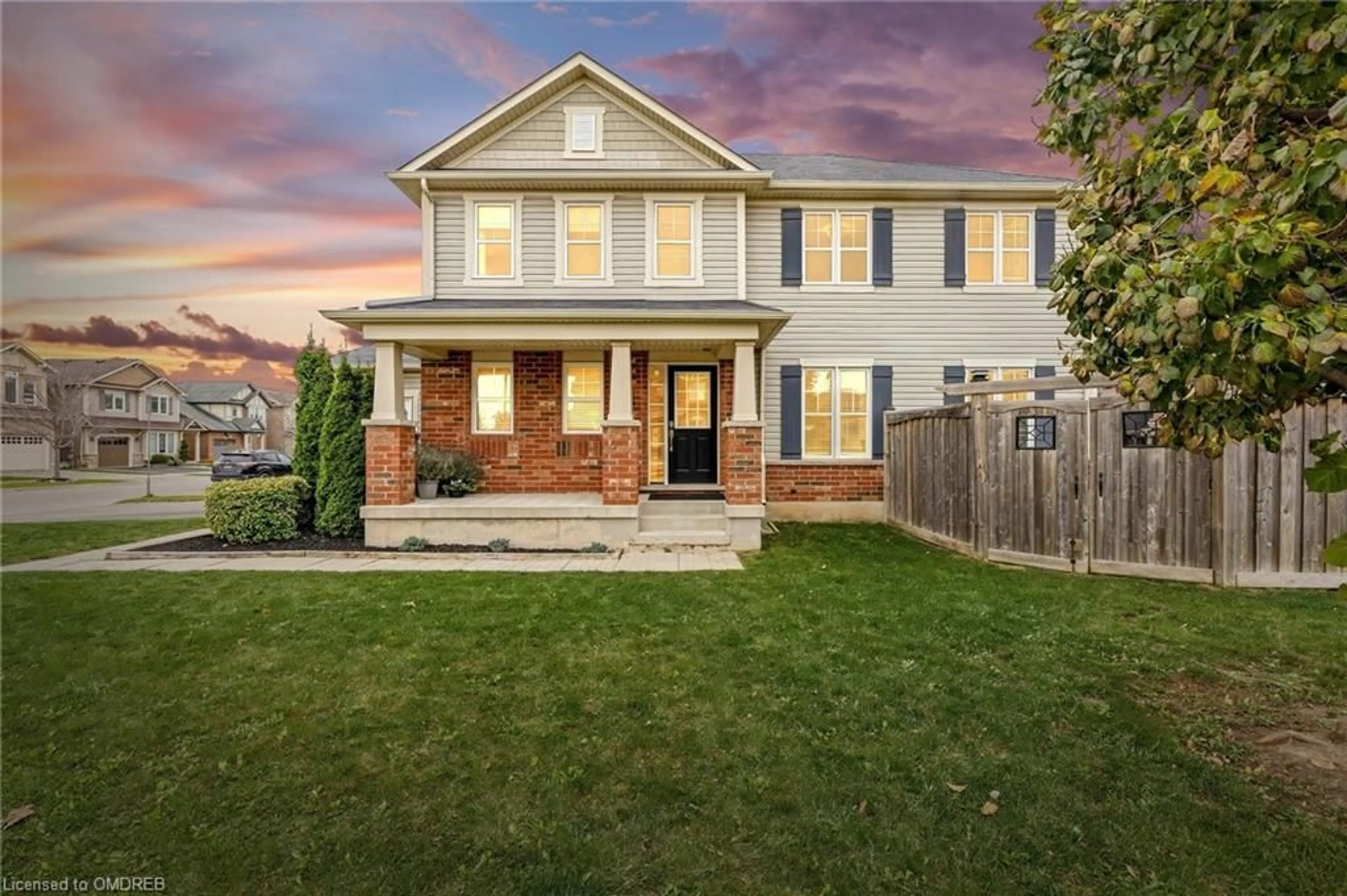 Frontside or backside of a home, the fenced backyard for 279 Leiterman Dr, Milton Ontario L9T 8B9