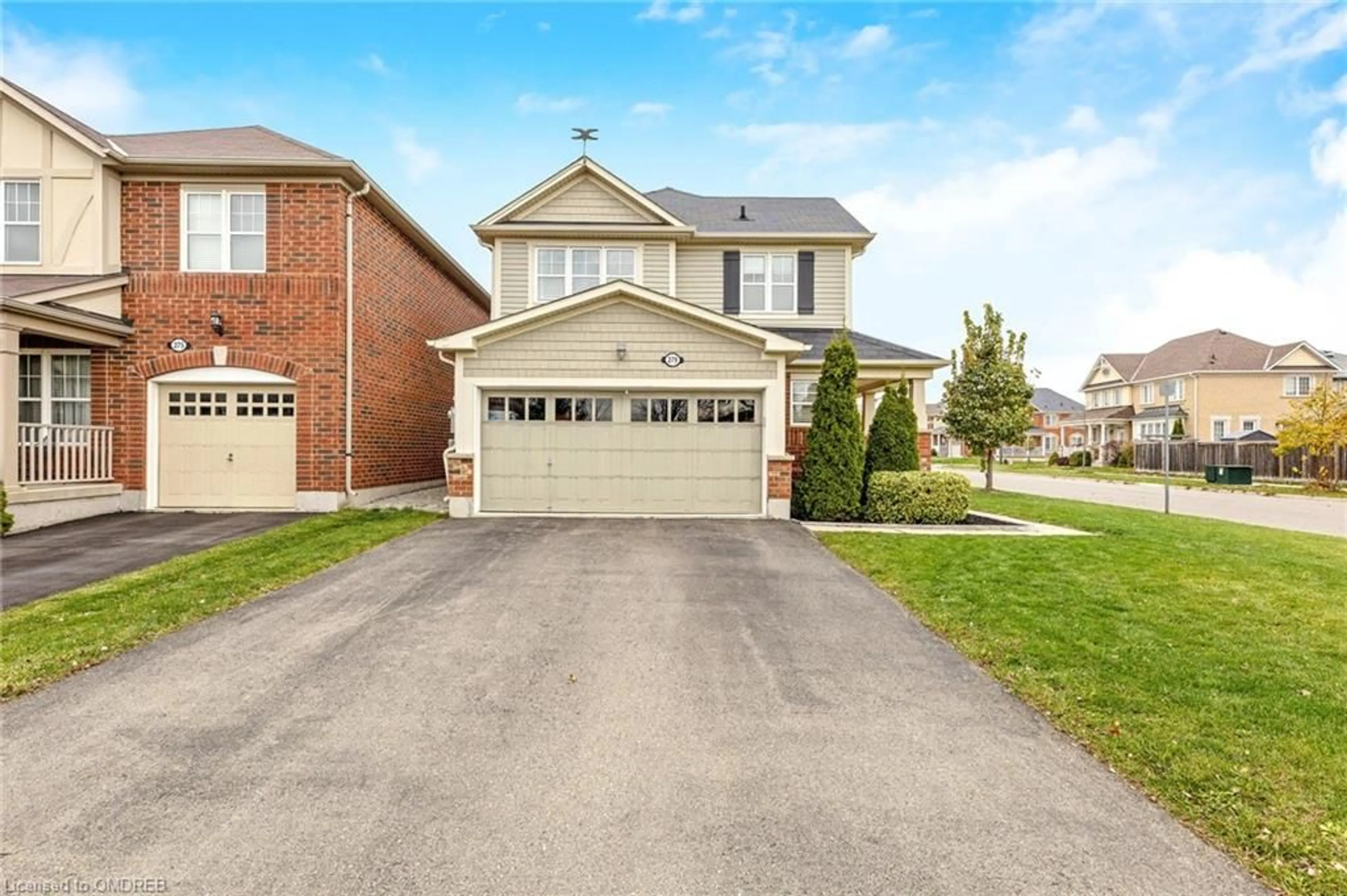 Frontside or backside of a home, the street view for 279 Leiterman Dr, Milton Ontario L9T 8B9