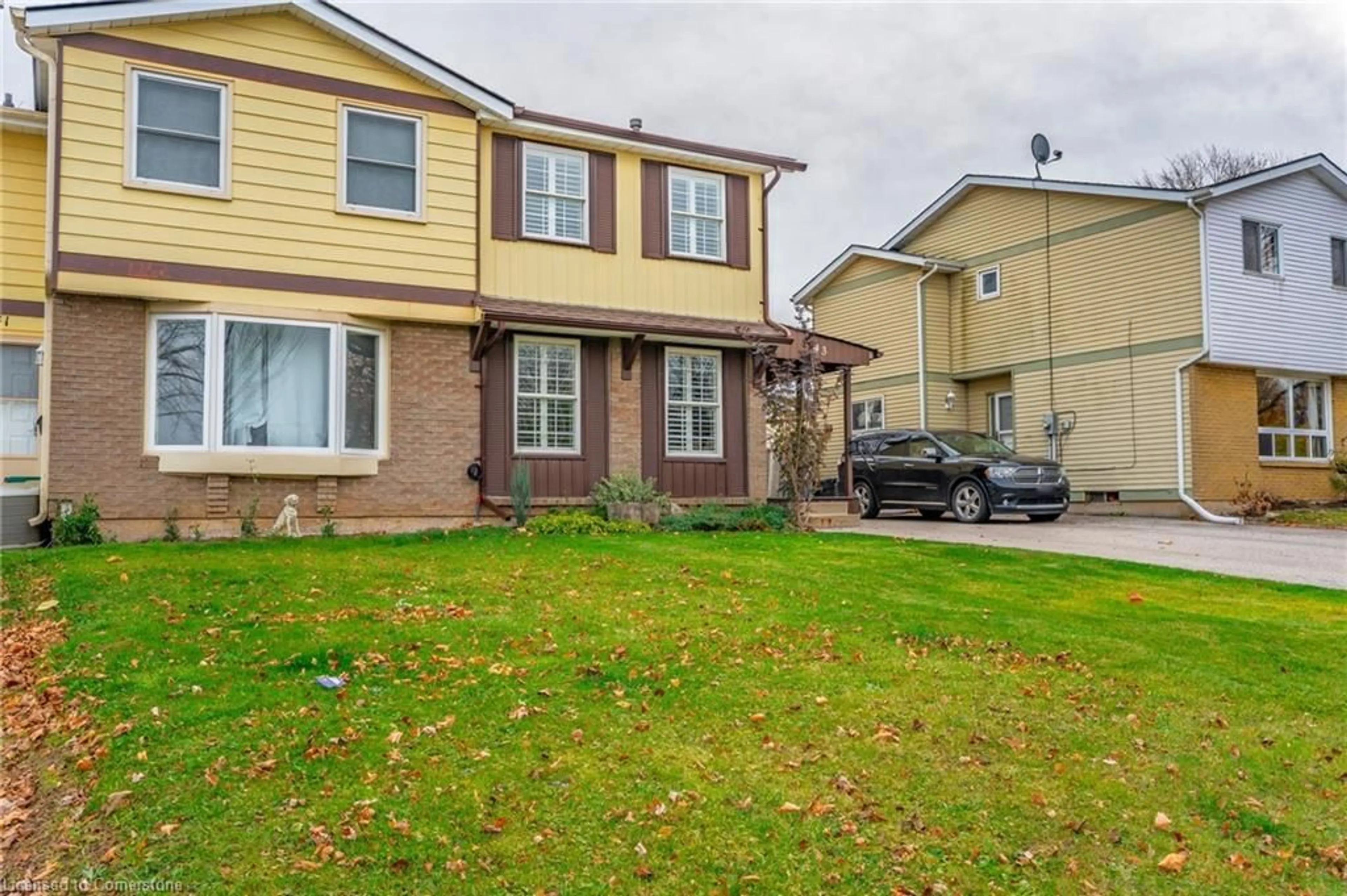 A pic from exterior of the house or condo, the fenced backyard for 43 Brantwood Park Rd, Brantford Ontario N3P 1E8