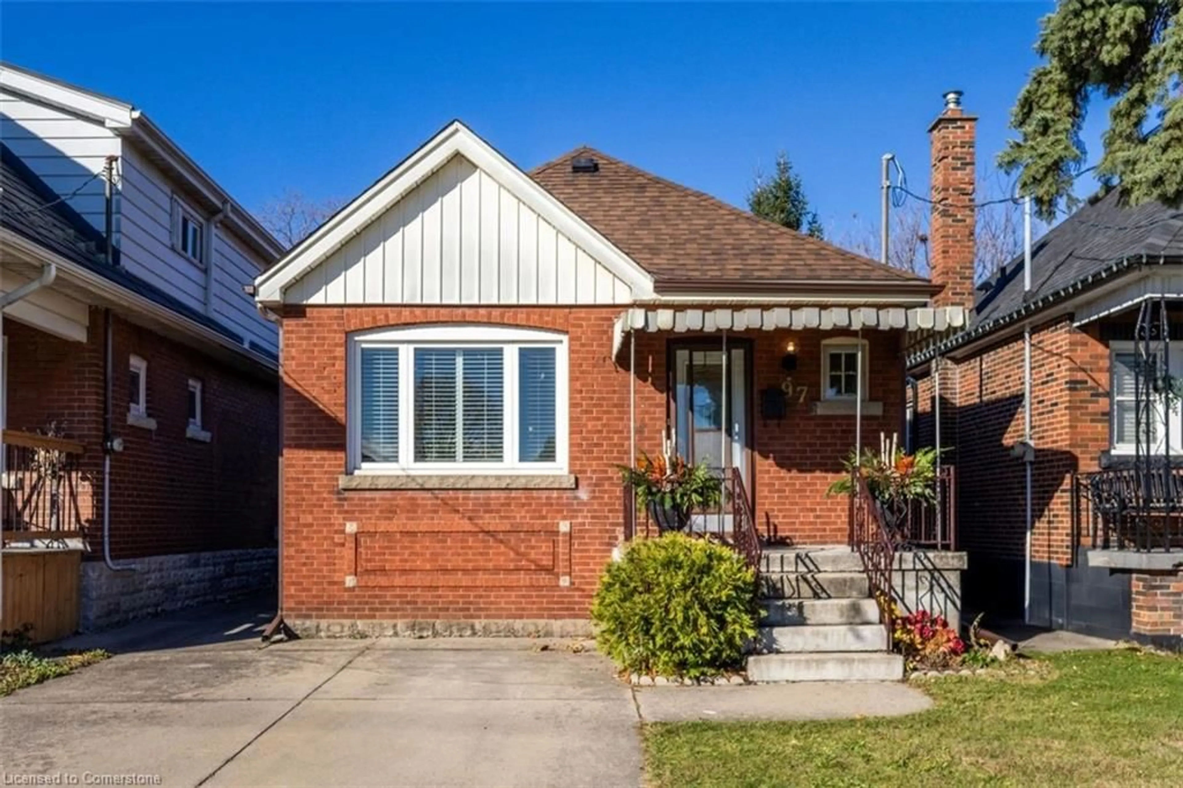 Home with brick exterior material for 97 Strathearne Ave, Hamilton Ontario L8H 5K6