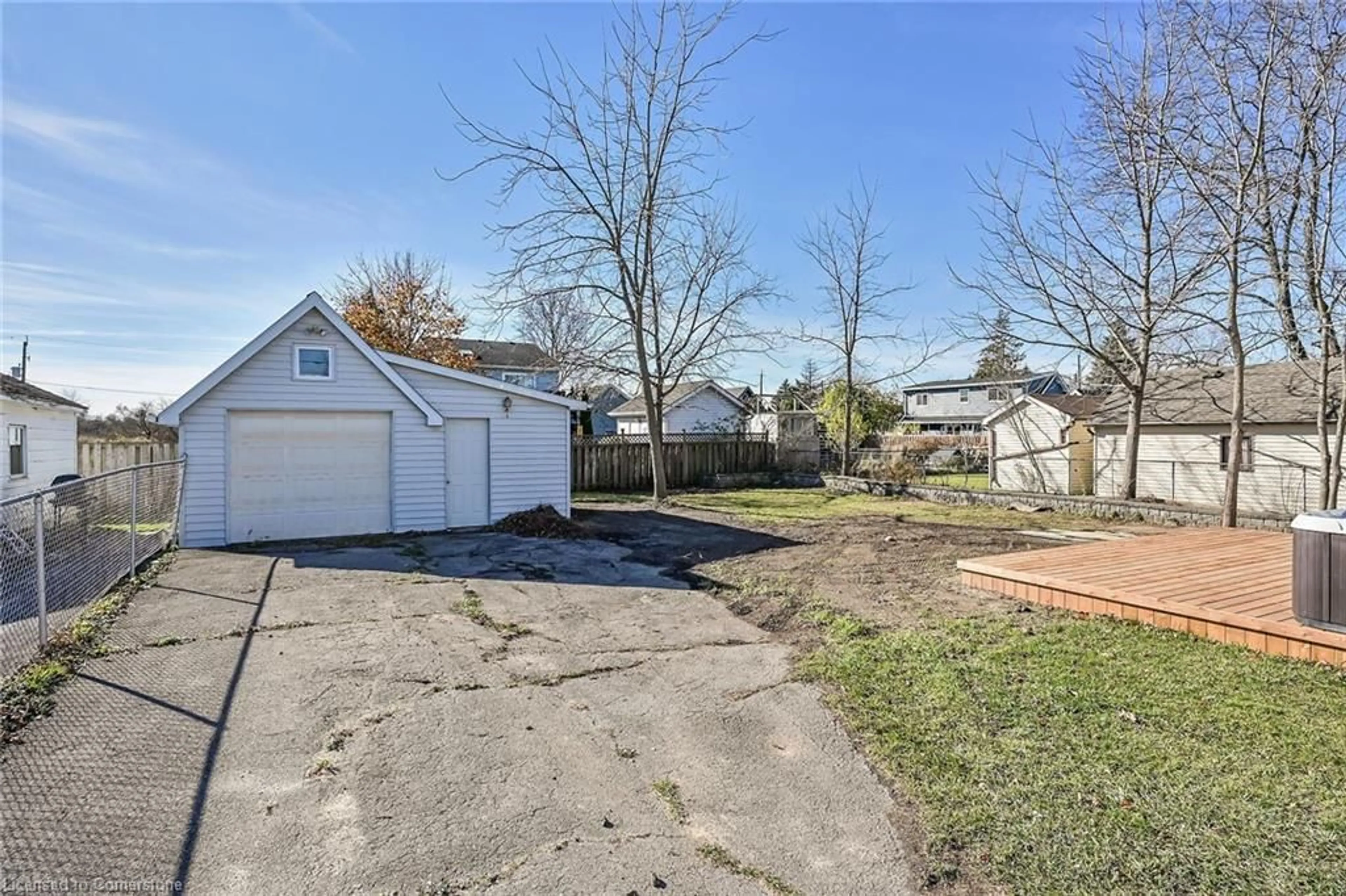 Frontside or backside of a home, the fenced backyard for 53 Jane St, Hagersville Ontario N0A 1H0