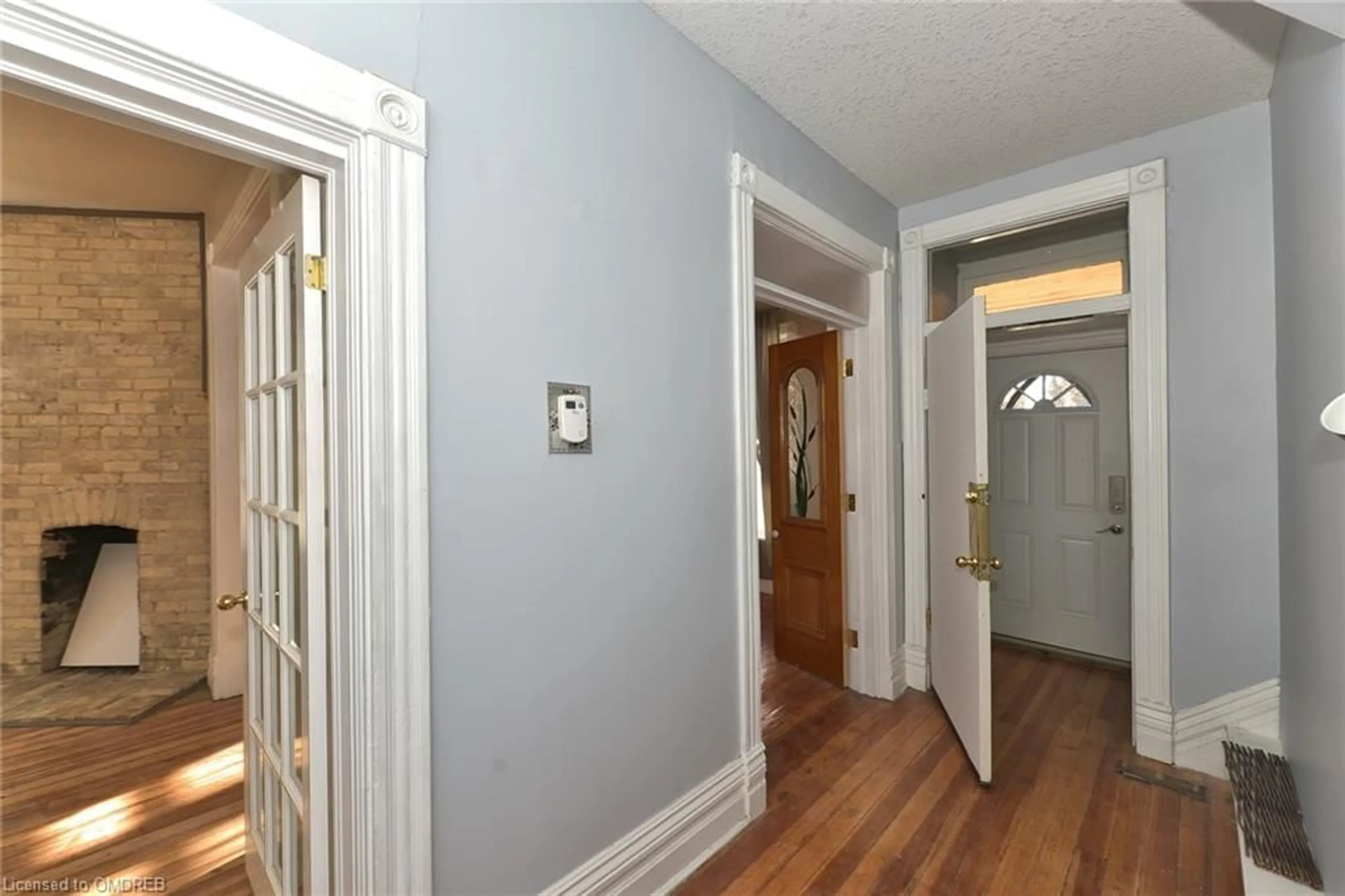 Indoor foyer, wood floors for 870 Queens Ave, London Ontario N5W 3H6