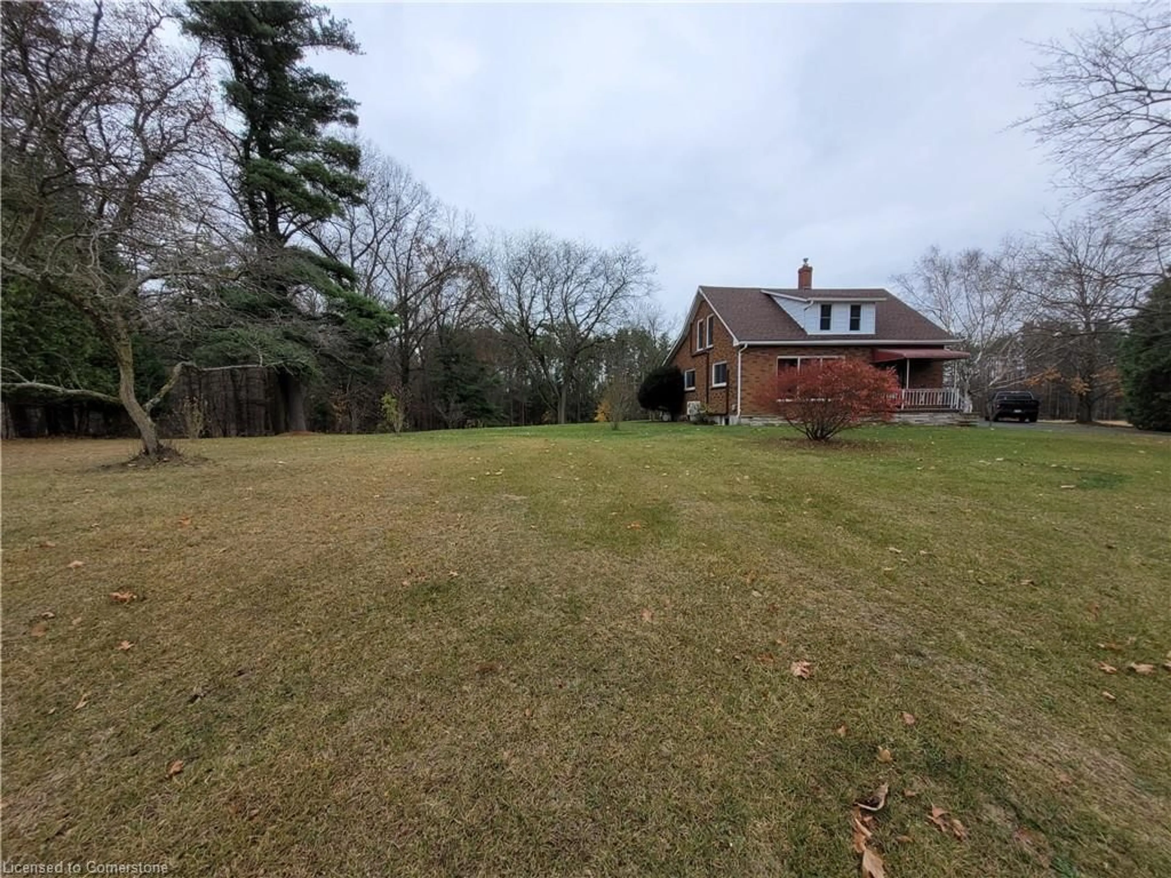 Frontside or backside of a home, the fenced backyard for 200 Charlotteville Road 10, Simcoe Ontario N3Y 4J9