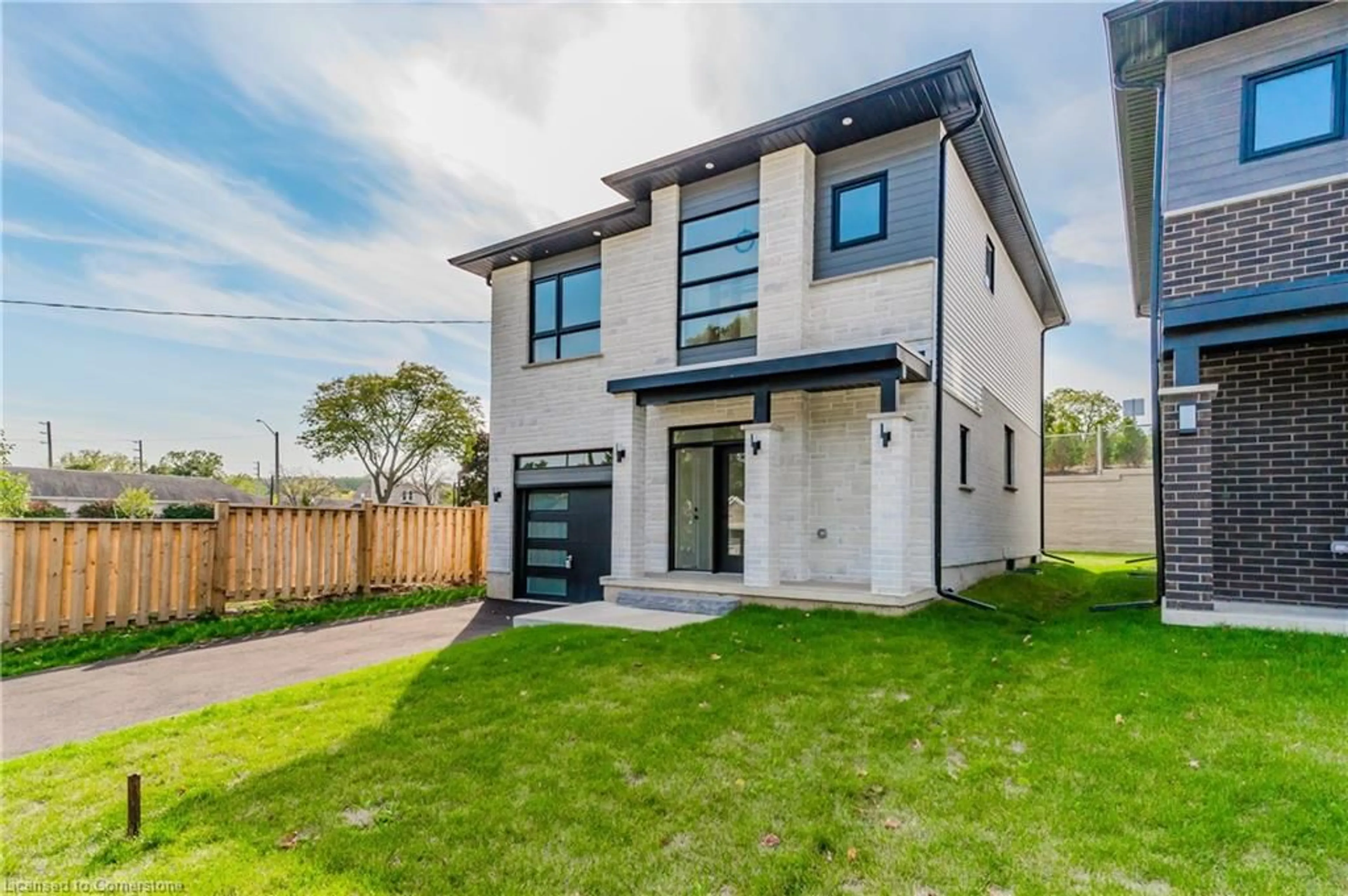 Frontside or backside of a home, the fenced backyard for 176 Forest Rd, Cambridge Ontario N1S 3B8