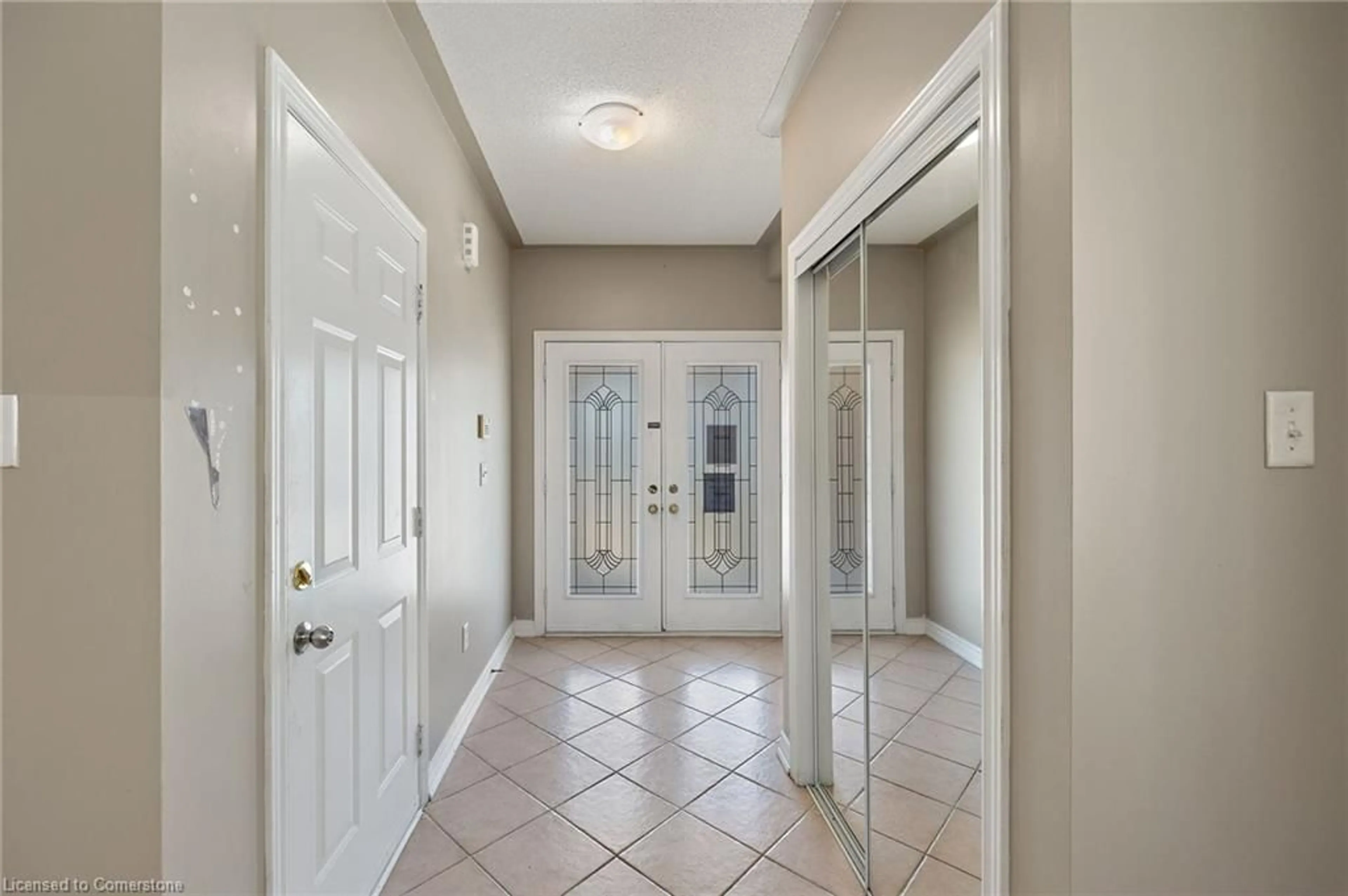 Indoor entryway, wood floors for 7173 Village Walk, Mississauga Ontario L5W 1X2