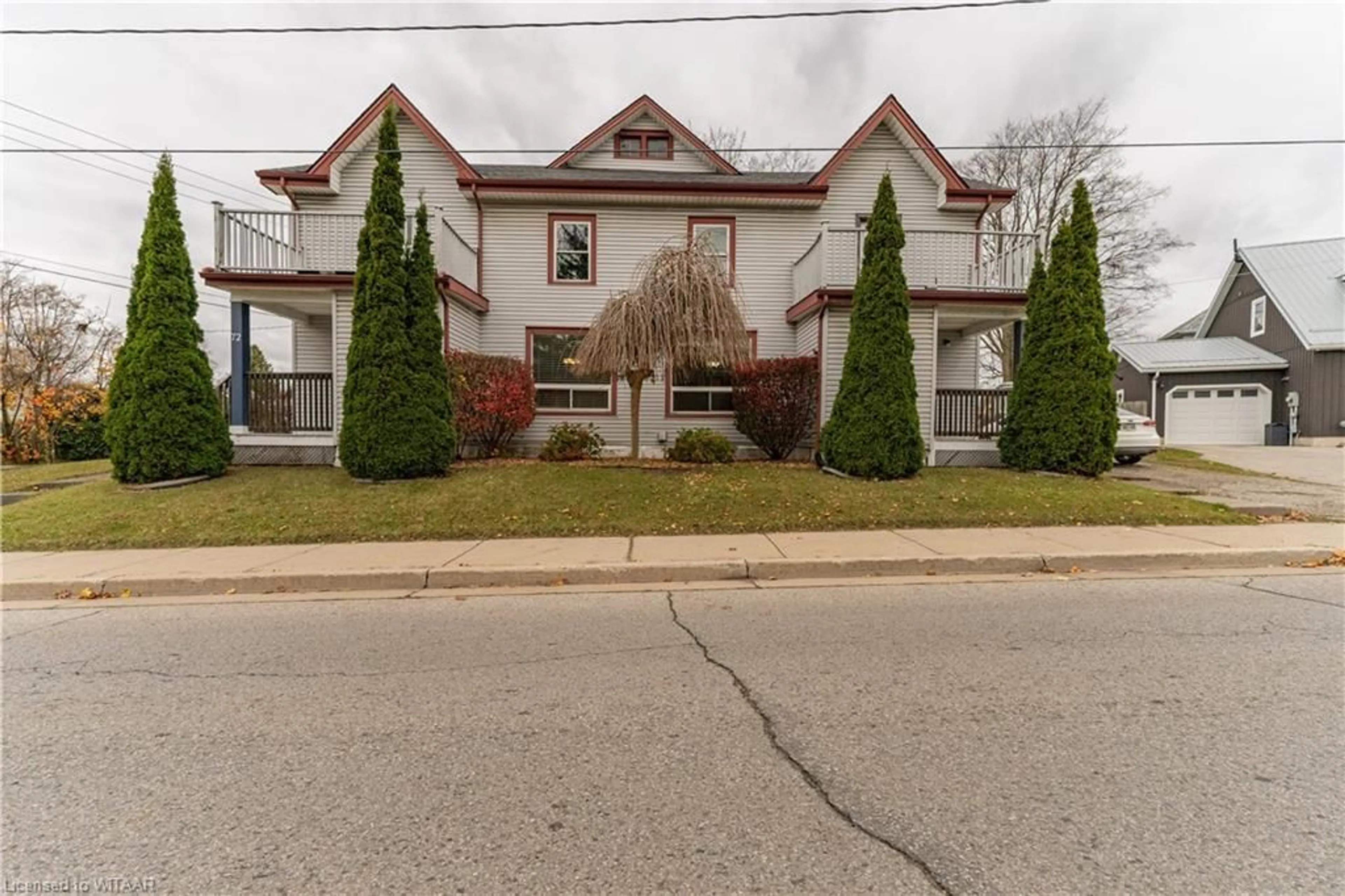 A pic from exterior of the house or condo, the street view for 72-74 Brock St, Tillsonburg Ontario N4G 1Z8