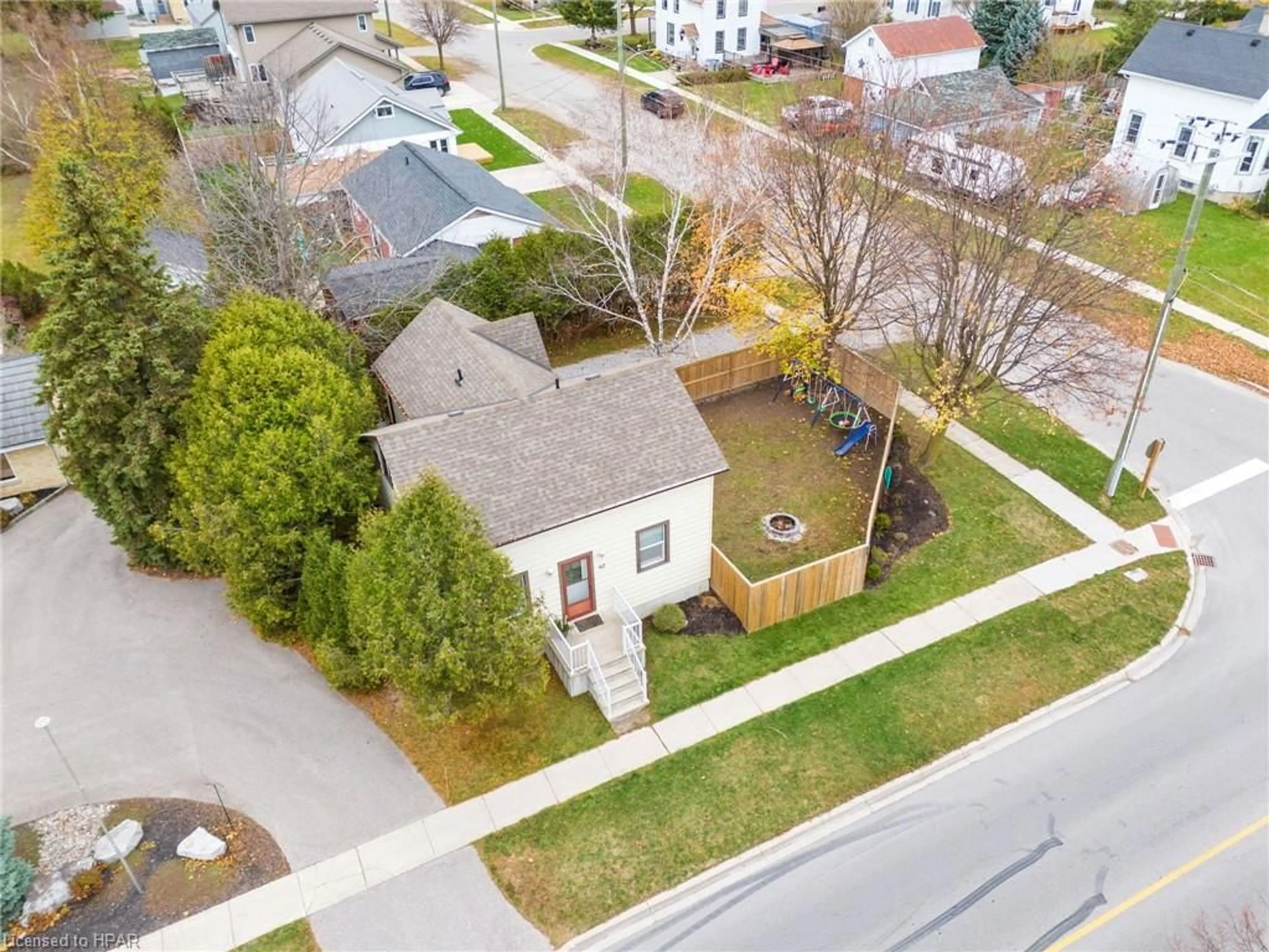 Frontside or backside of a home, the fenced backyard for 62 Main St, Zurich Ontario N0M 2T0