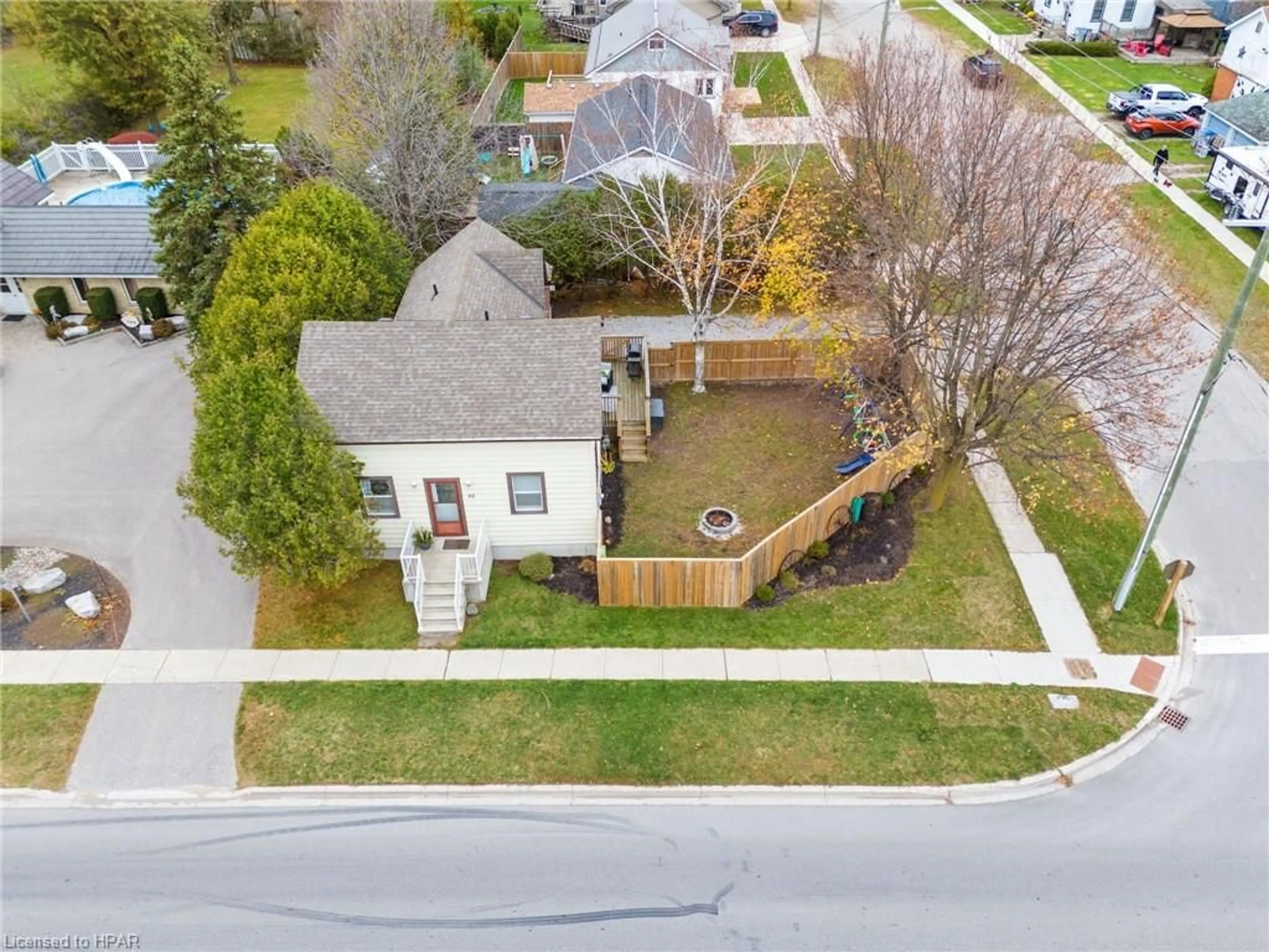 Frontside or backside of a home, the fenced backyard for 62 Main St, Zurich Ontario N0M 2T0