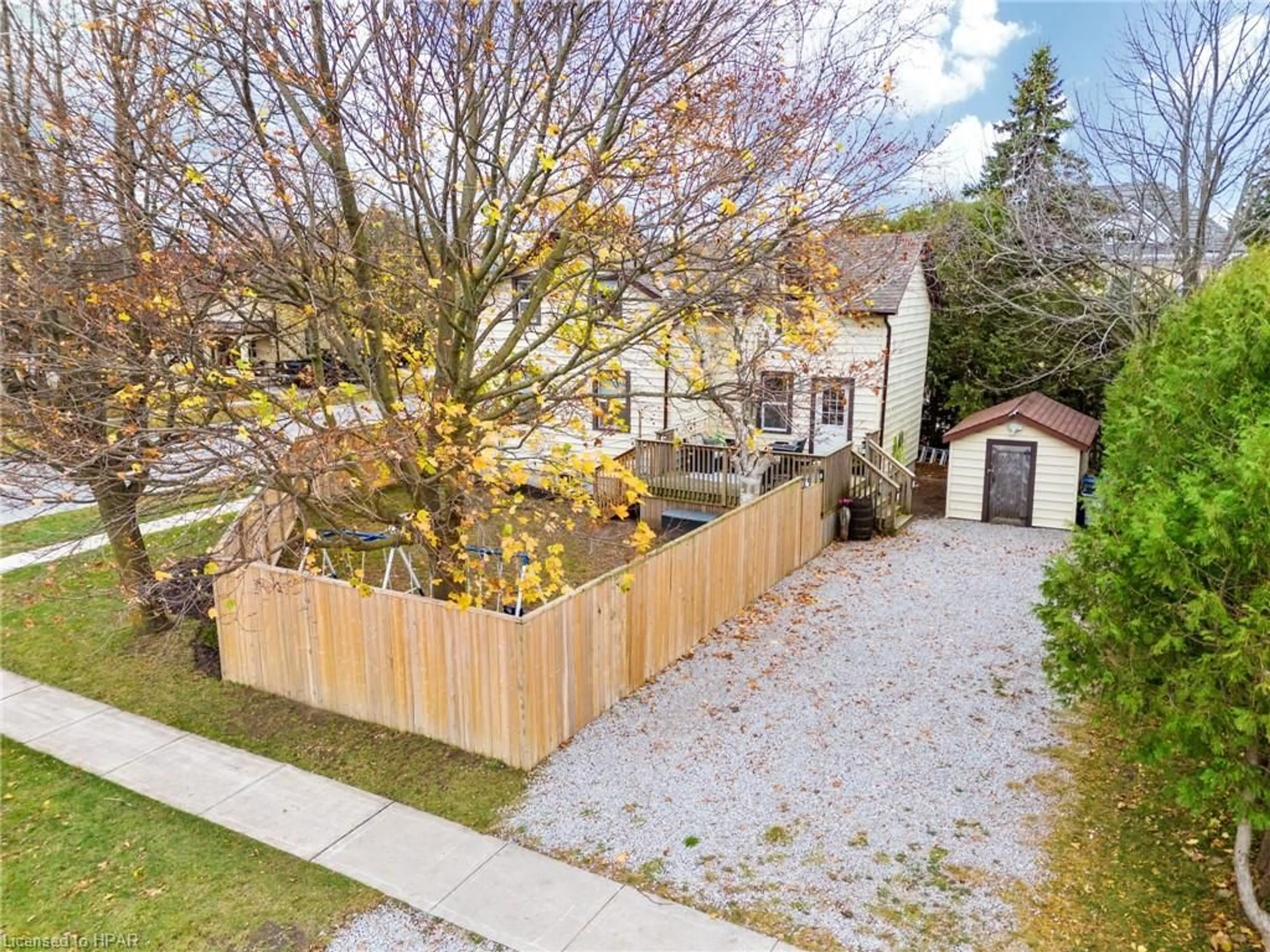 Frontside or backside of a home, the fenced backyard for 62 Main St, Zurich Ontario N0M 2T0