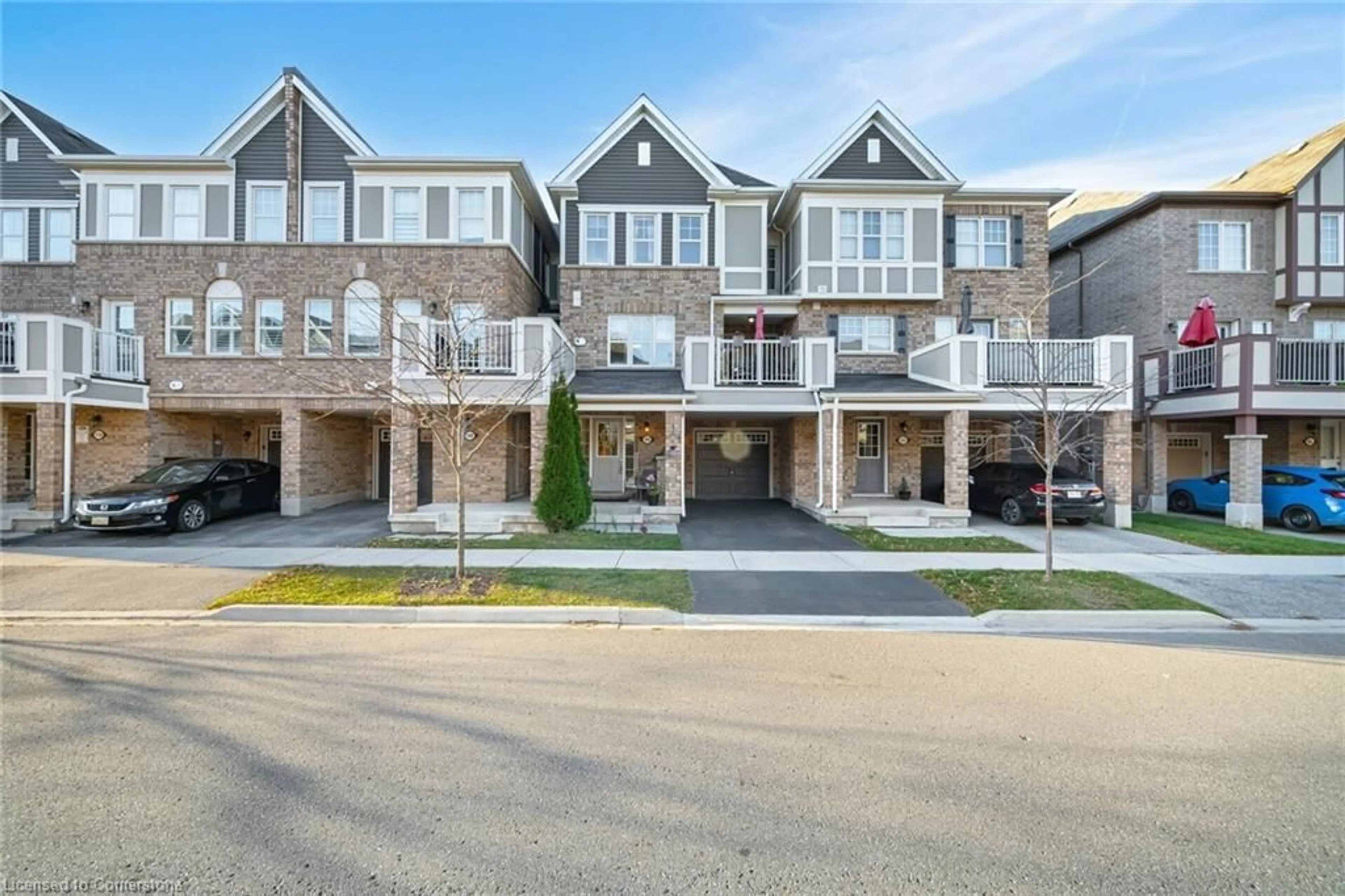 A pic from exterior of the house or condo, the street view for 106 Lemieux Crt, Milton Ontario L9E 1E9