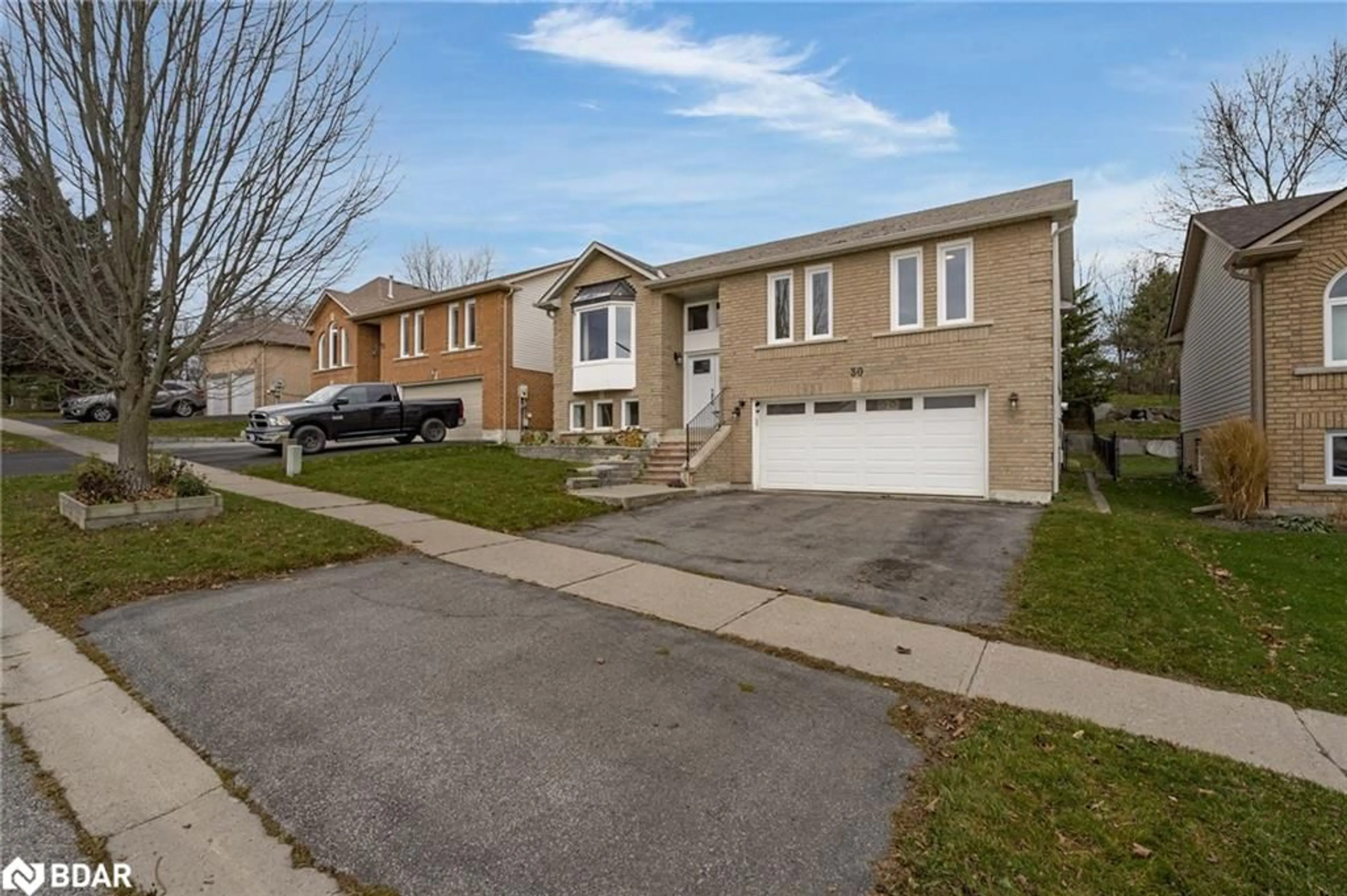 Frontside or backside of a home, the street view for 30 Frontier Ave, Orillia Ontario L3V 7S8