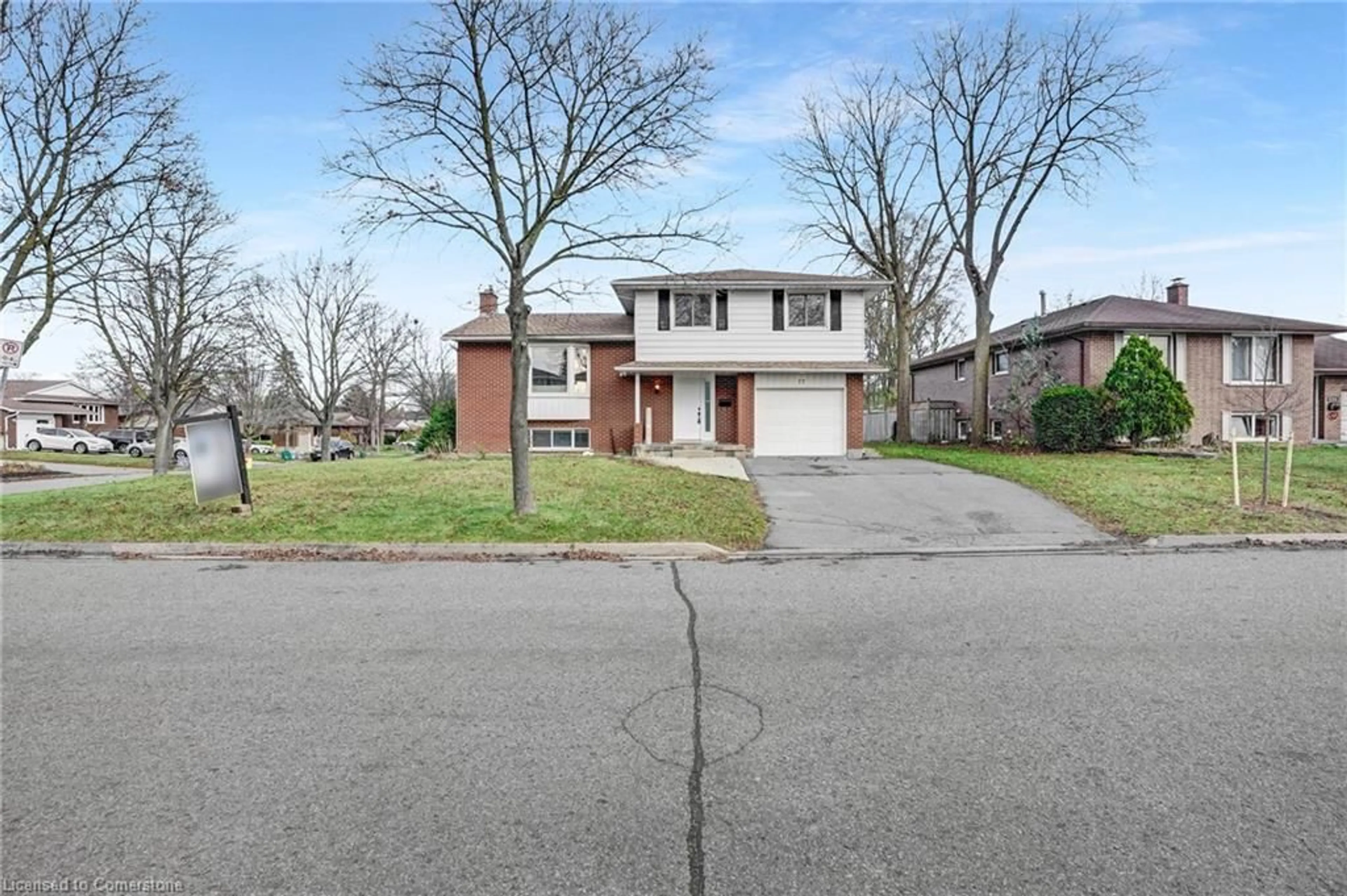 Frontside or backside of a home, the street view for 77 Orchard Mill Cres, Kitchener Ontario N2P 1T2