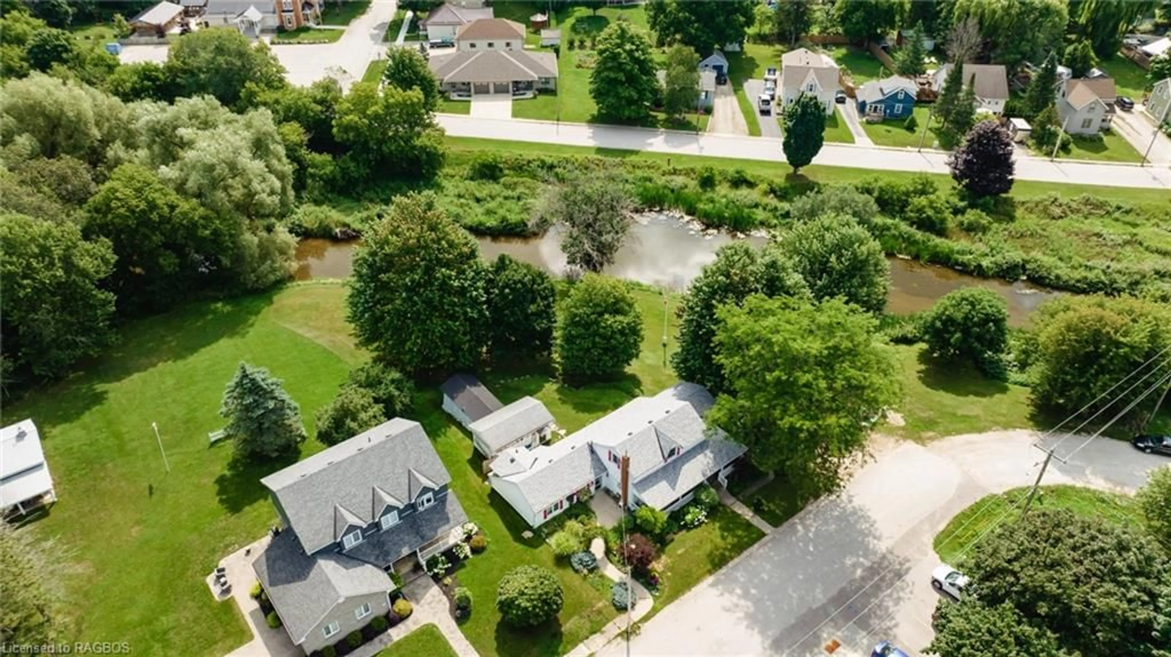 Frontside or backside of a home, the street view for 57 Maria St, Tara Ontario N0H 2N0