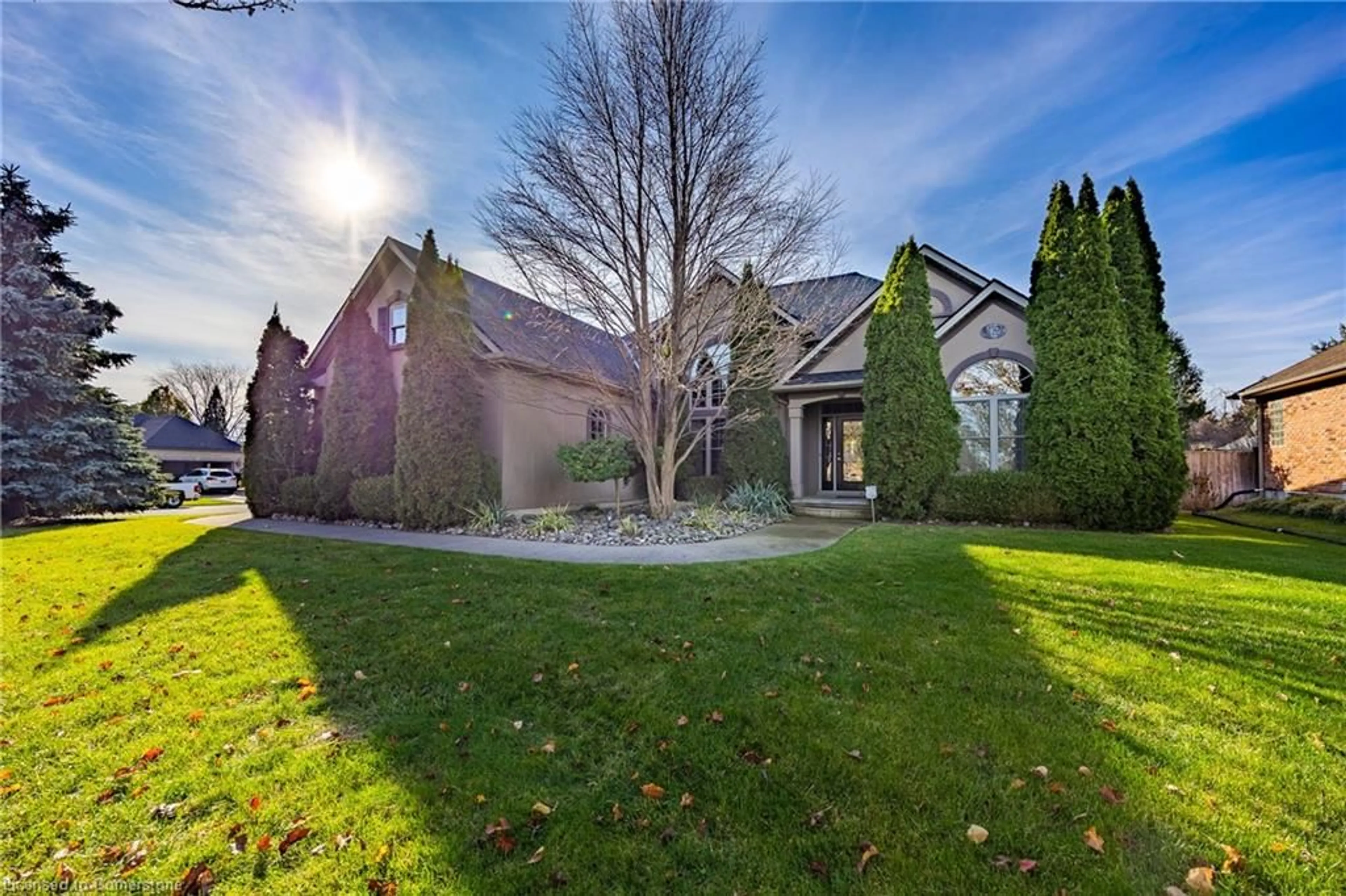 Frontside or backside of a home, the fenced backyard for 32 Blossom Ave, Simcoe Ontario N3Y 3H8