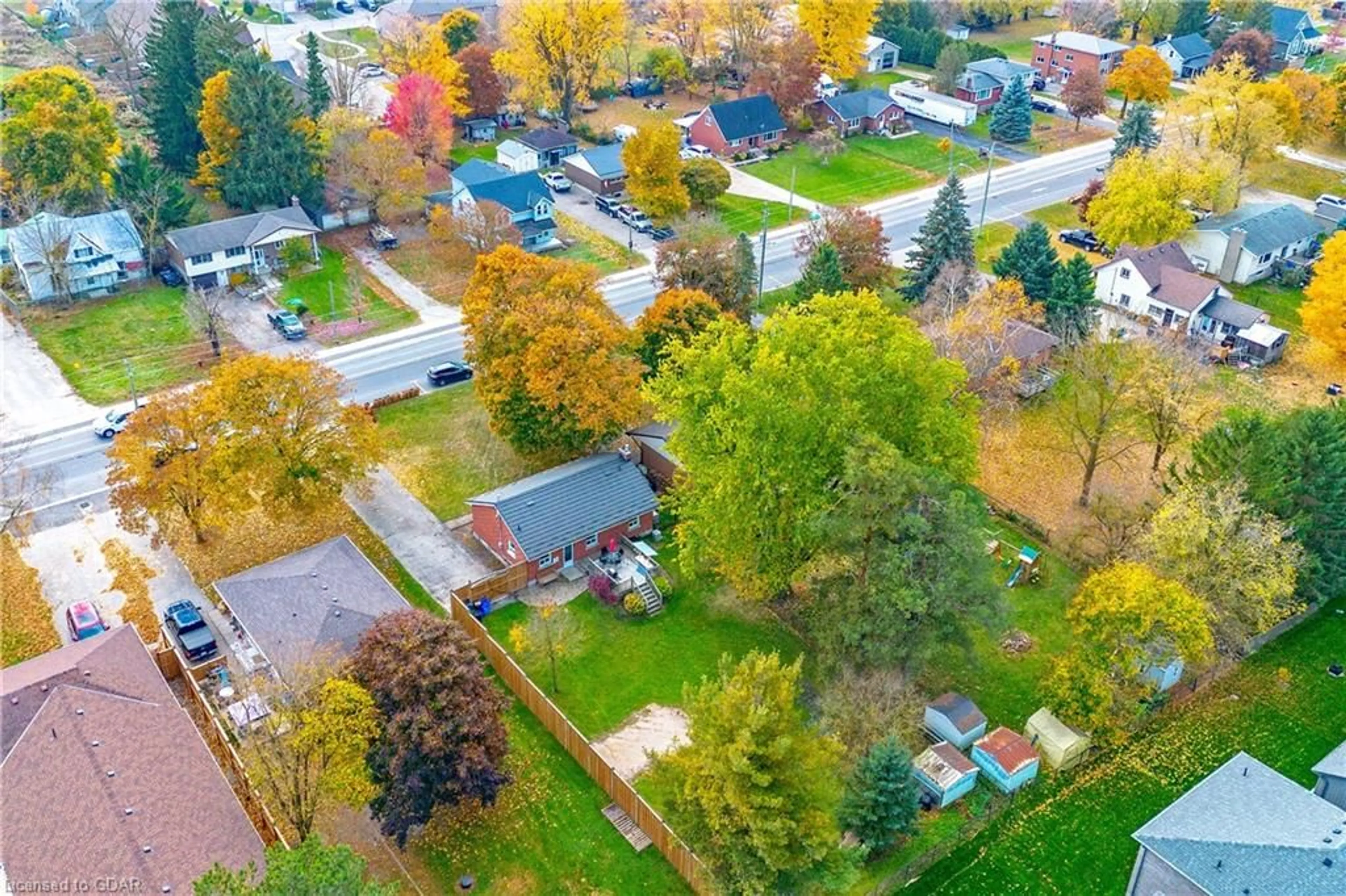 Frontside or backside of a home, the fenced backyard for 342 Smith Street, Arthur Ontario N0G 1A0