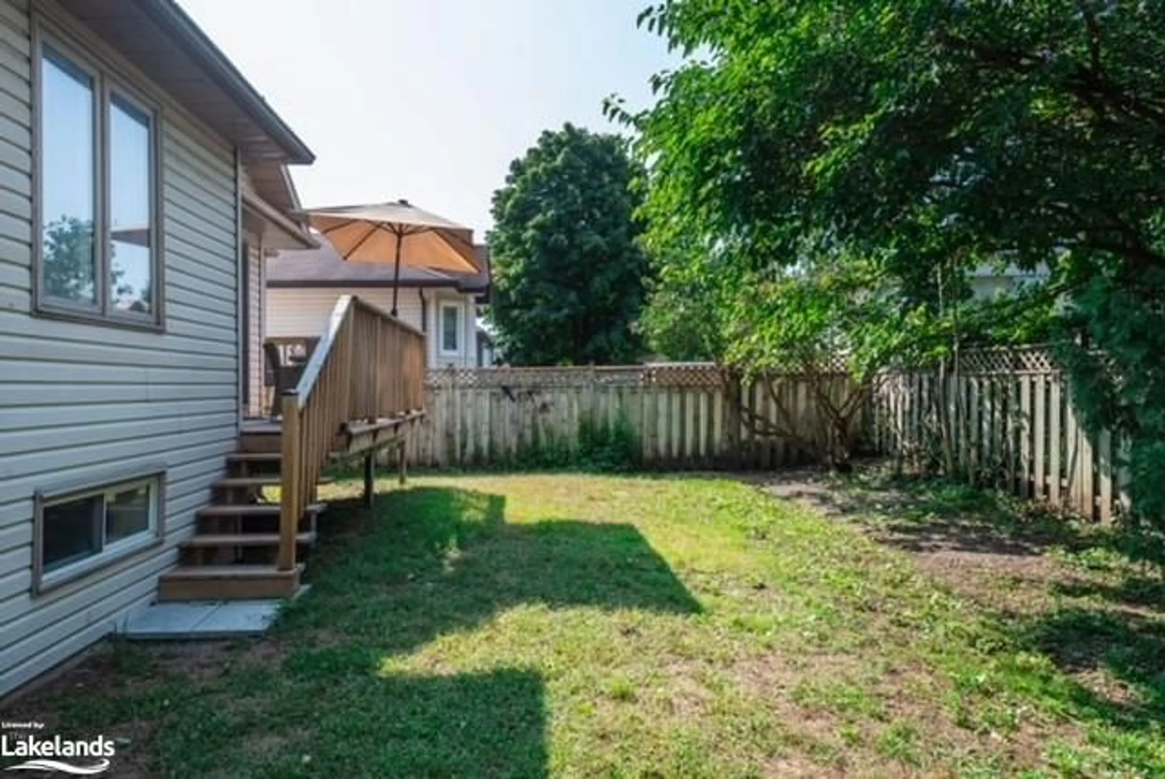 Patio, the fenced backyard for 4 Riverdale Dr, Wasaga Beach Ontario L9Z 1E9