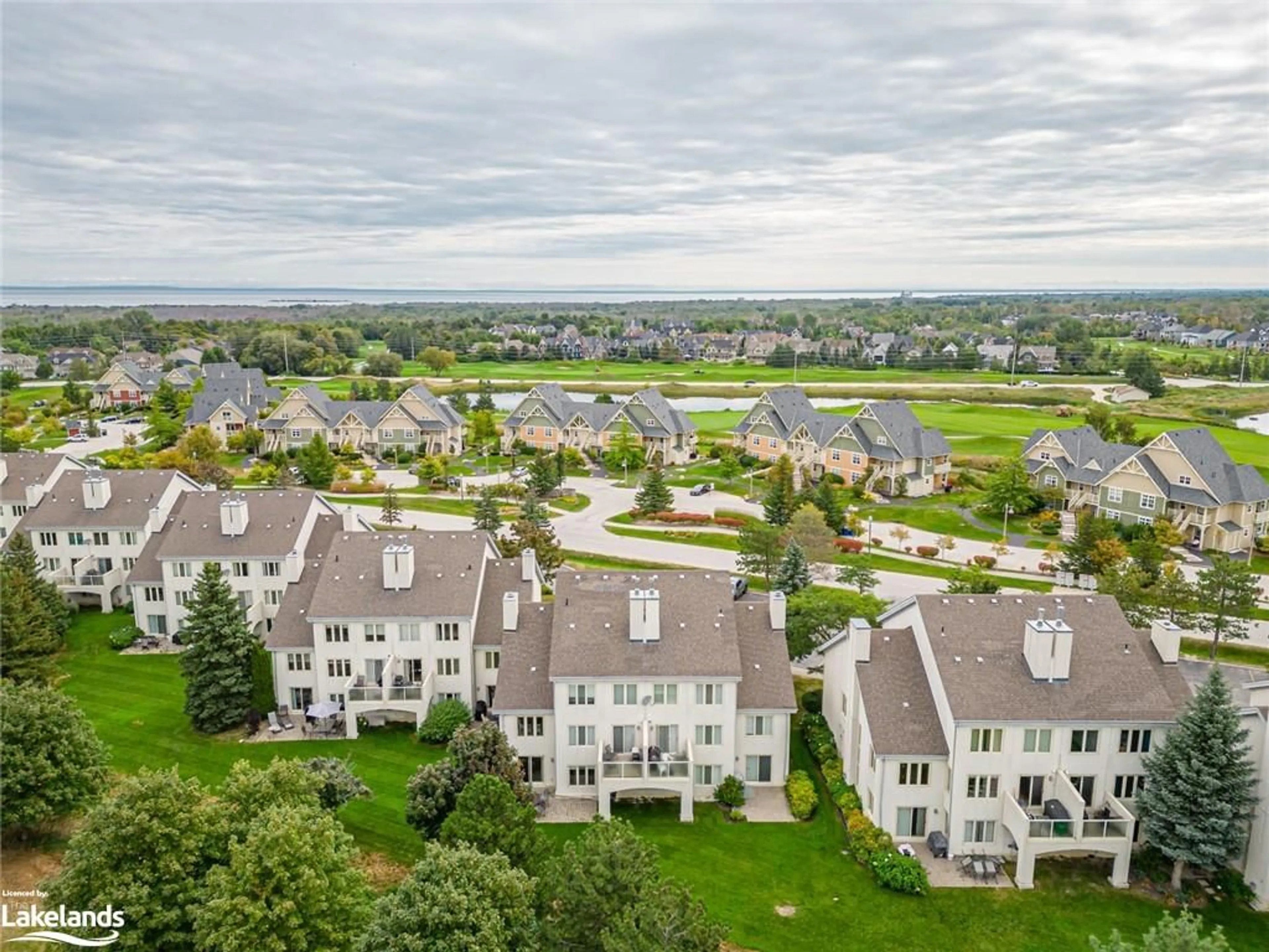 A pic from exterior of the house or condo, the view of city buildings for 110 Fairway Crt #108, The Blue Mountains Ontario L9Y 0P8