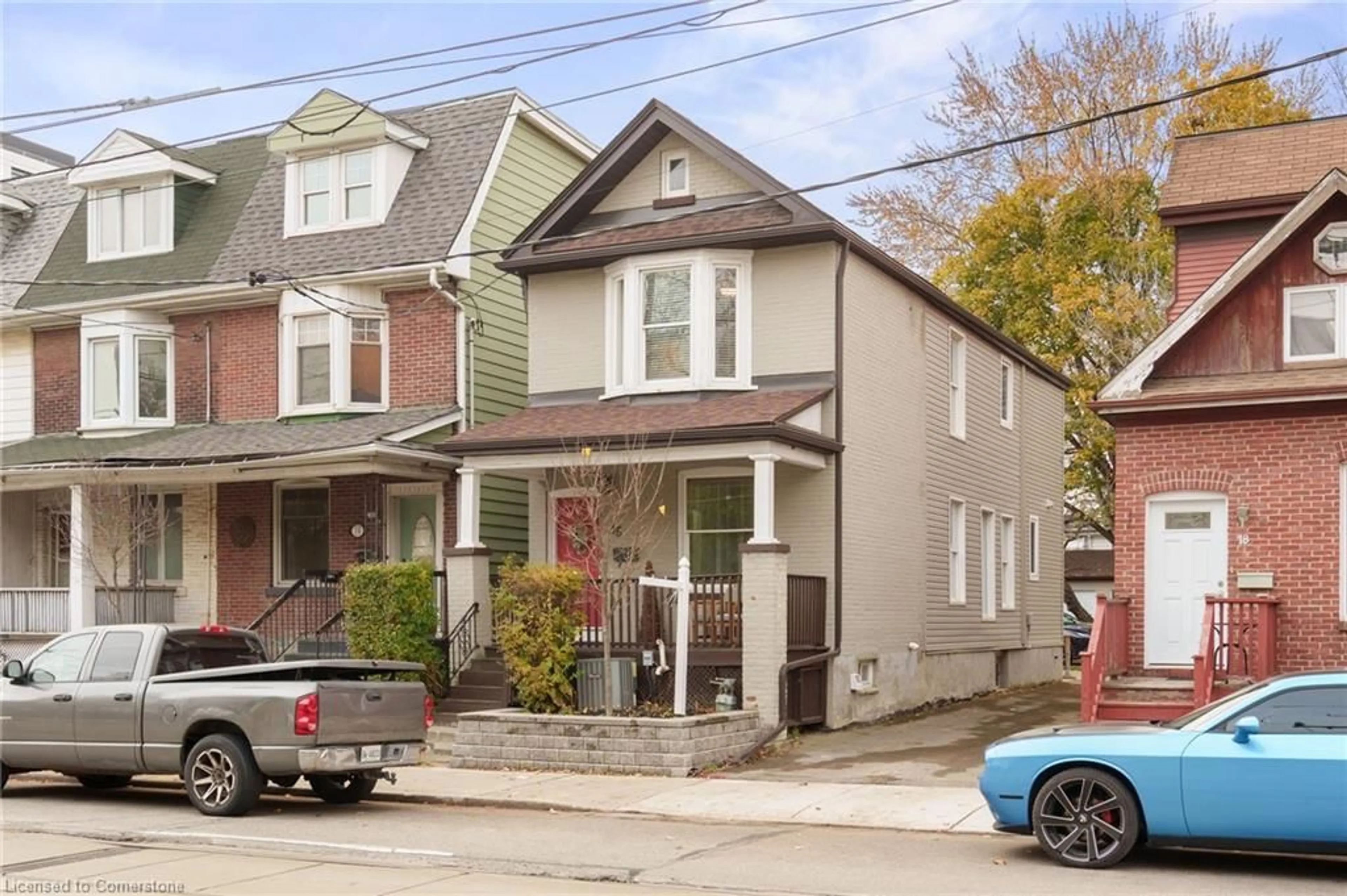 A pic from exterior of the house or condo, the street view for 16 Coxwell Ave, Toronto Ontario M4L 3A7