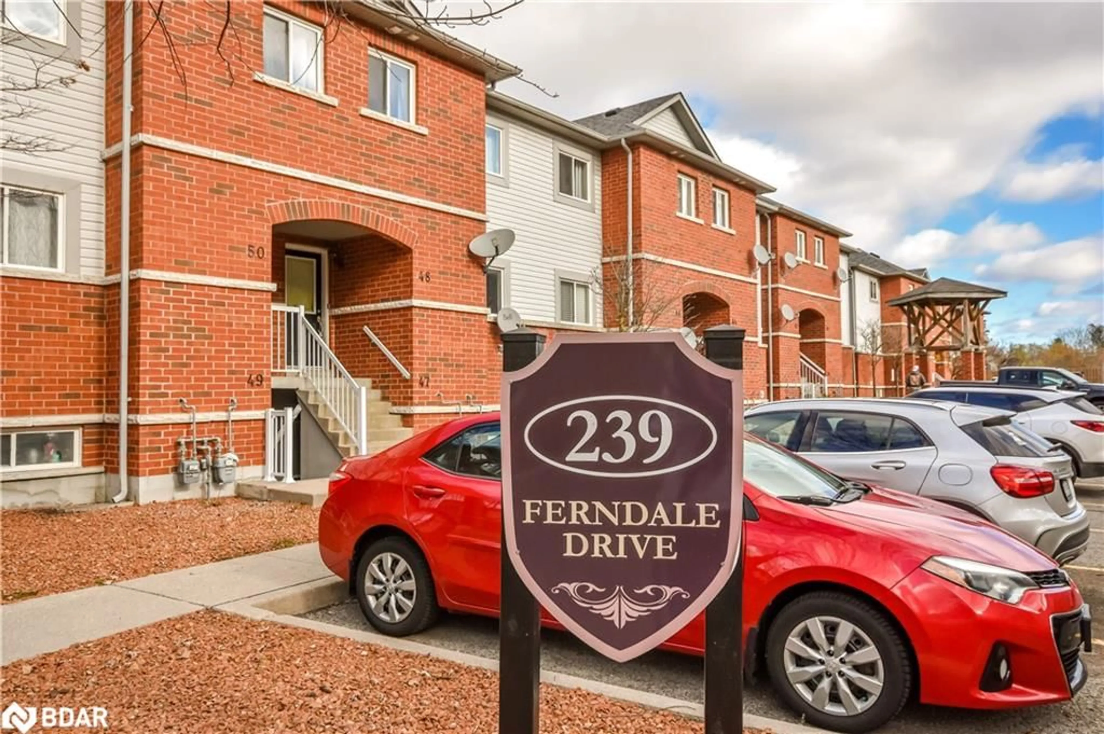 A pic from exterior of the house or condo, the street view for 239 Ferndale Dr #47, Barrie Ontario L4N 0T6