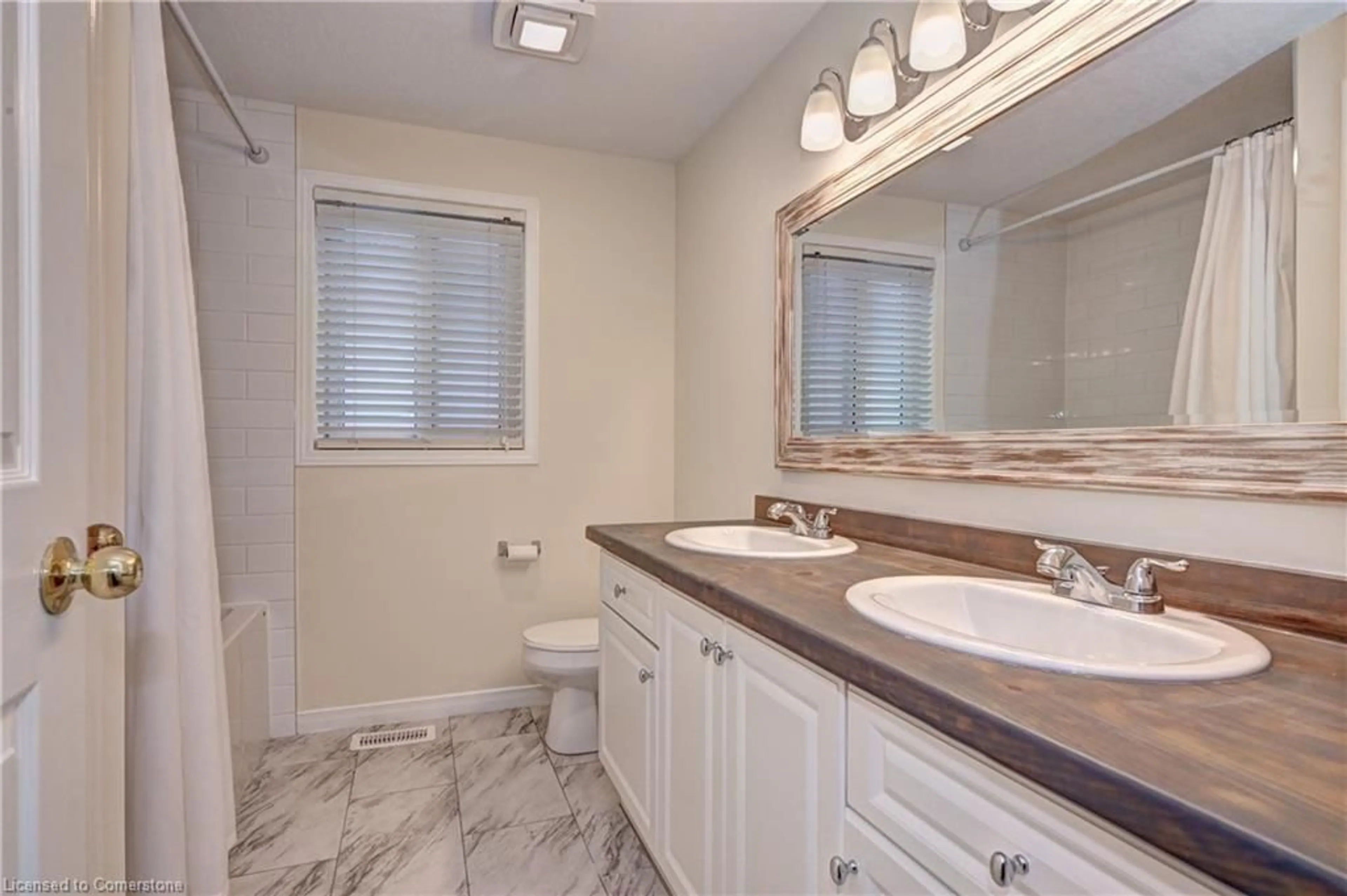 Bathroom, ceramic floors for 79 Activa Ave, Kitchener Ontario N2E 3R4